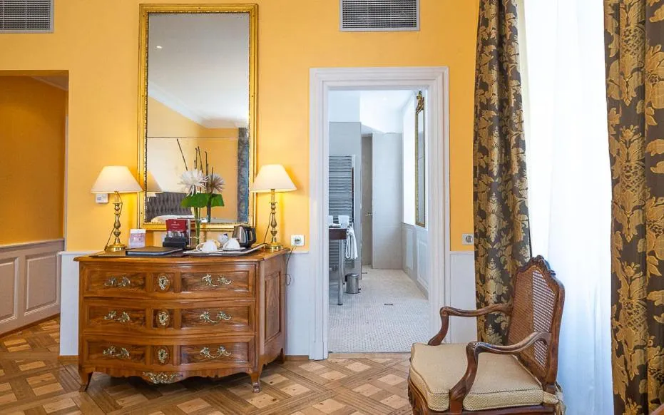 Bedroom in Hôtel & Spa Le Bouclier D'or