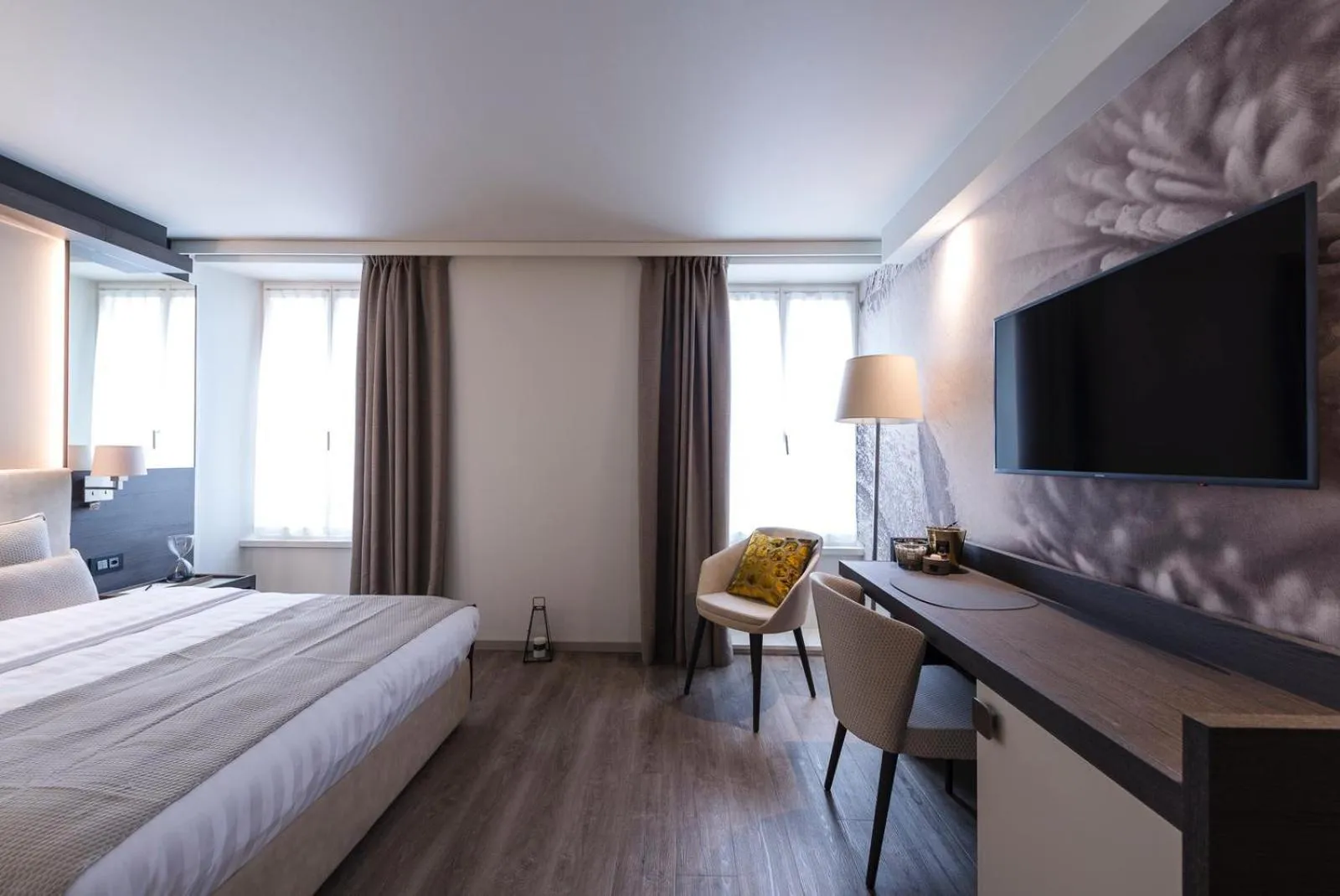 Photo of the whole room, Bed in Ambassador Boutique Hotel