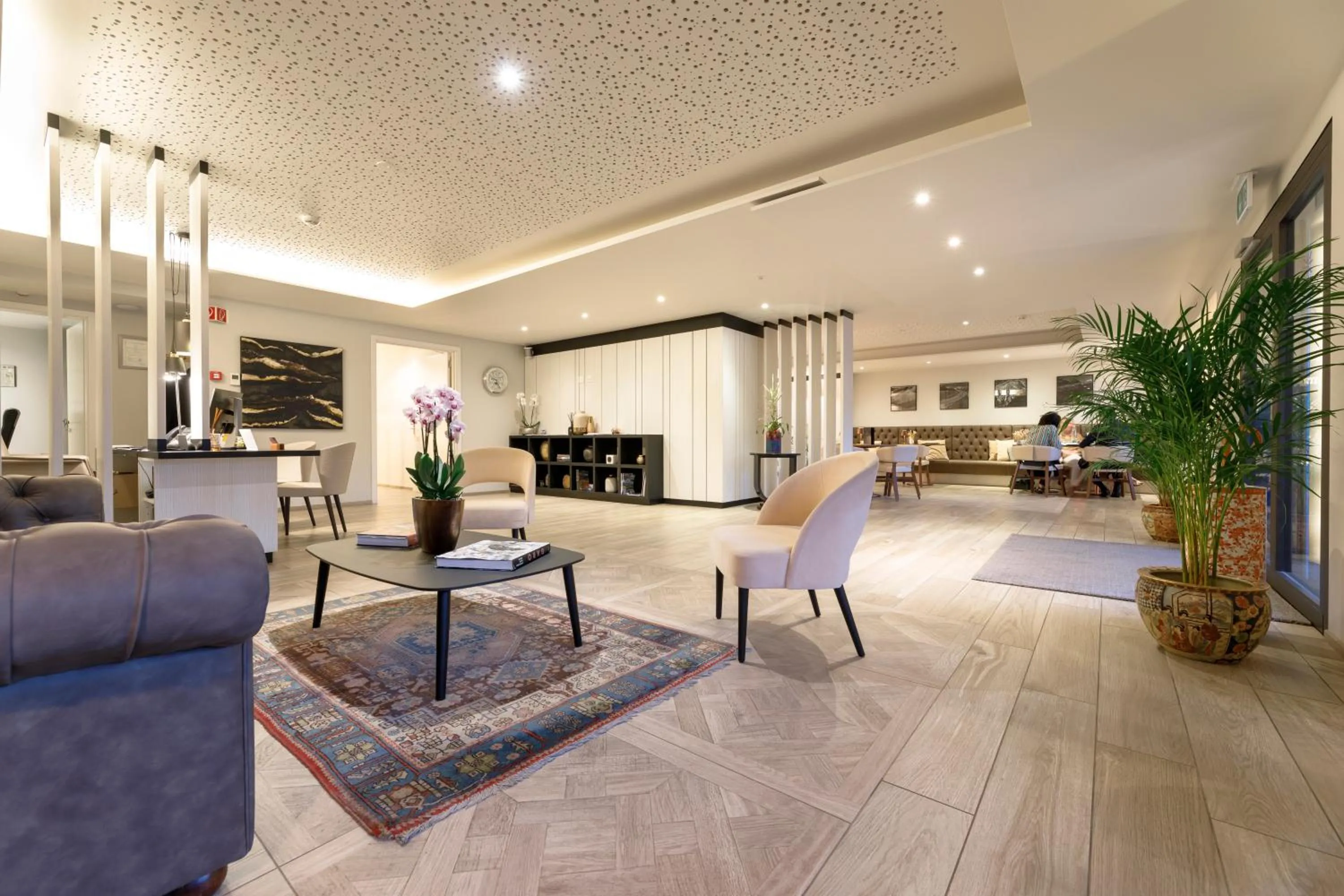 Lobby or reception in Ambassador Boutique Hotel