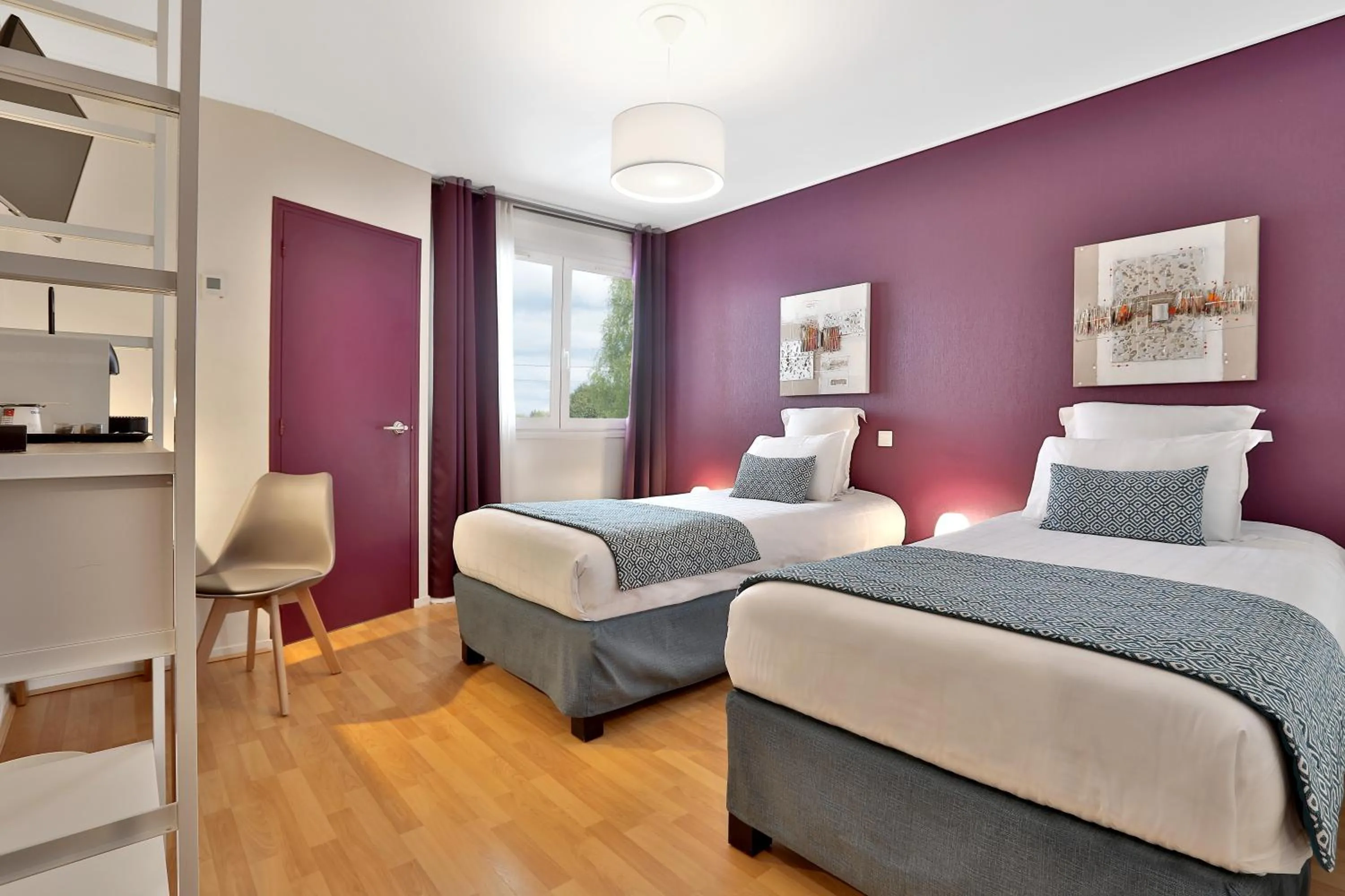 Twin Room with Garden View in Logis Hôtel Restaurant Europa