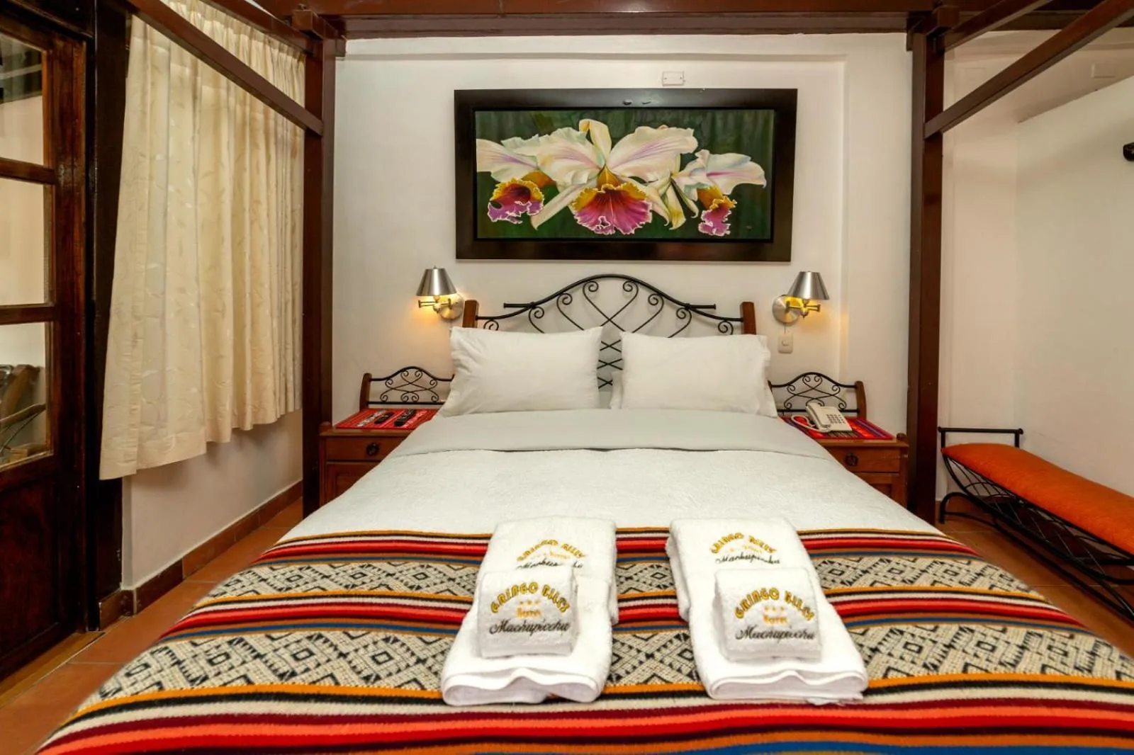 Bed in Gringo Bill's Boutique Hotel