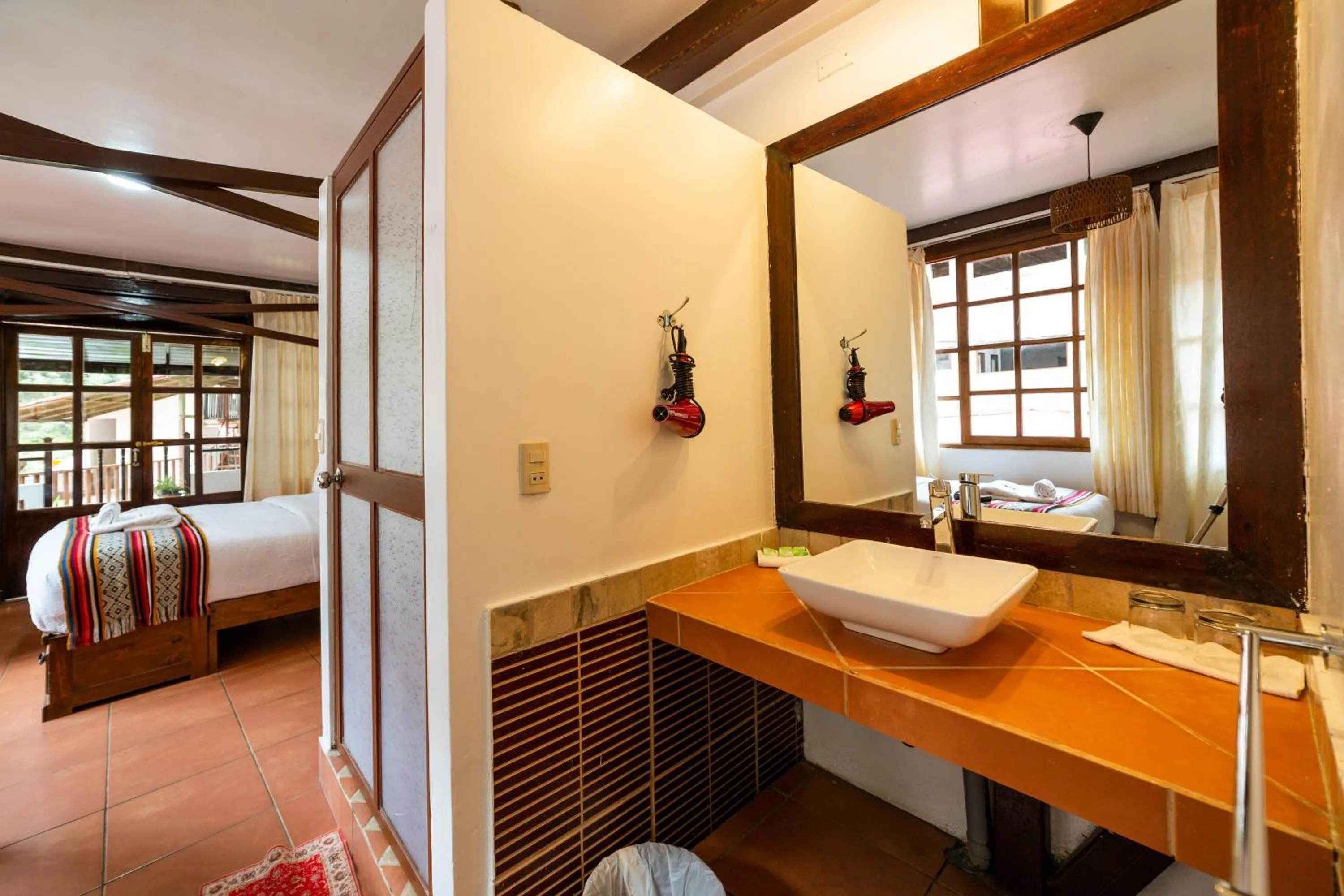 Bed in Gringo Bill's Boutique Hotel