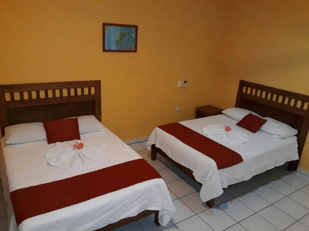 Bed in Casa Coral Cozumel