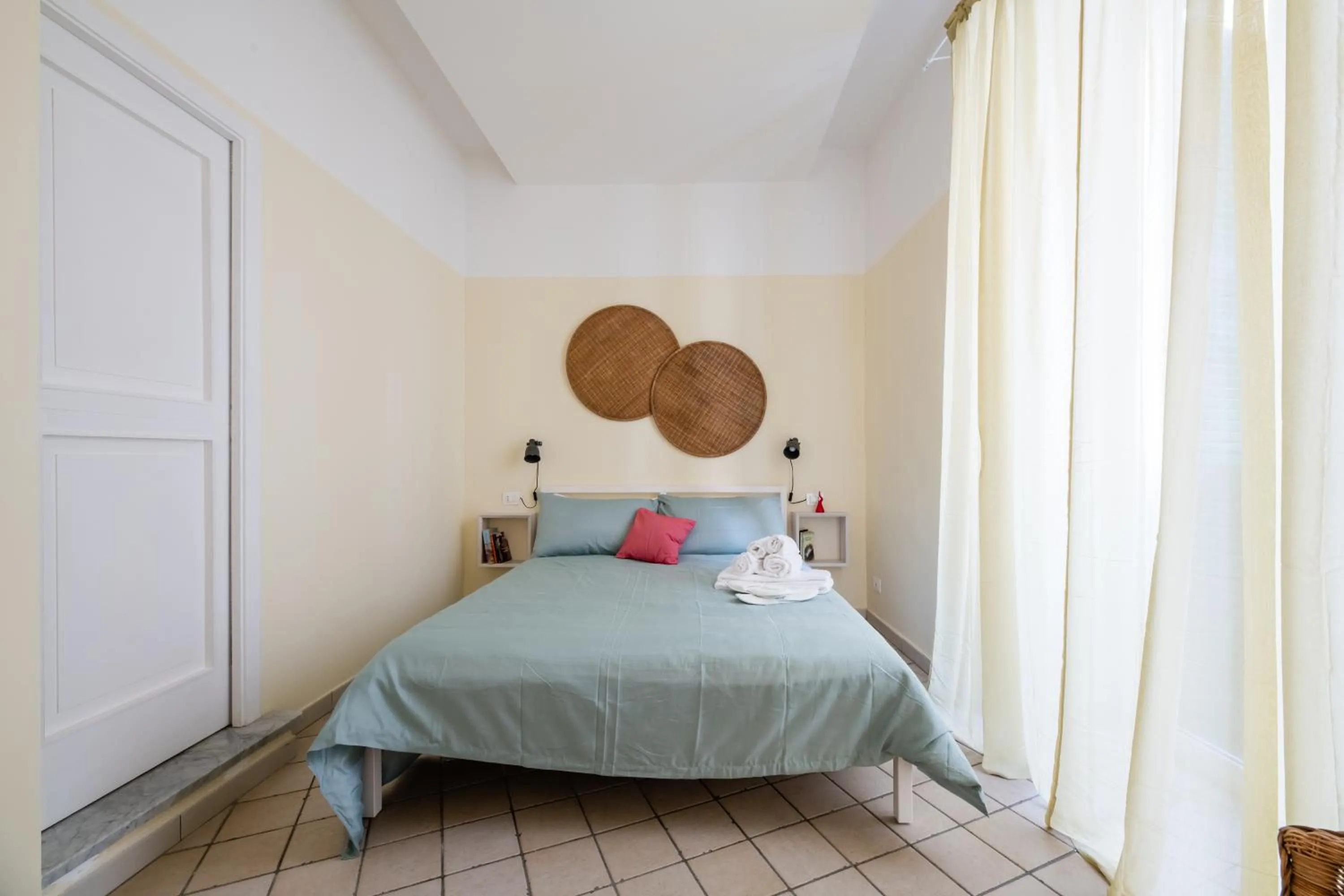 Bed in Madì Rooms