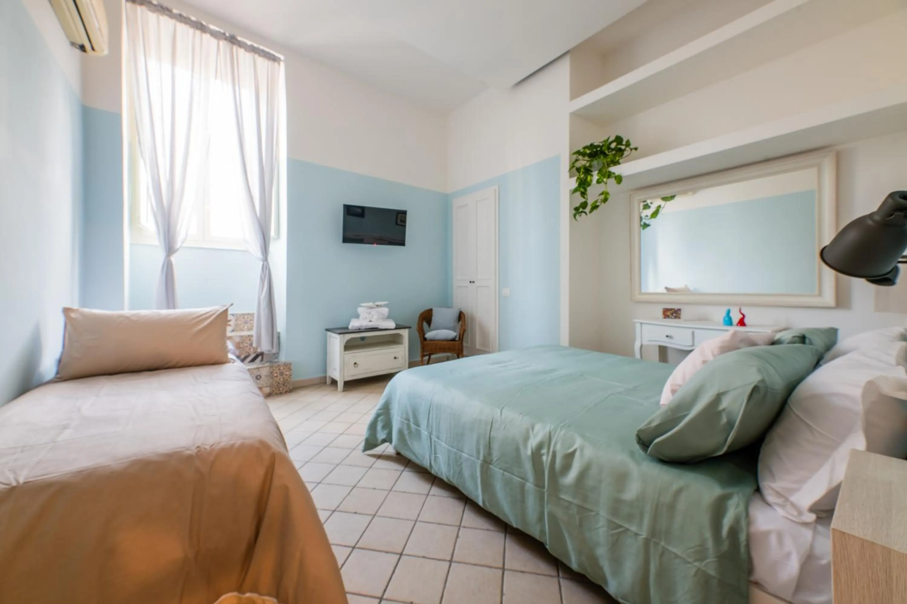 Bed in Madì Rooms