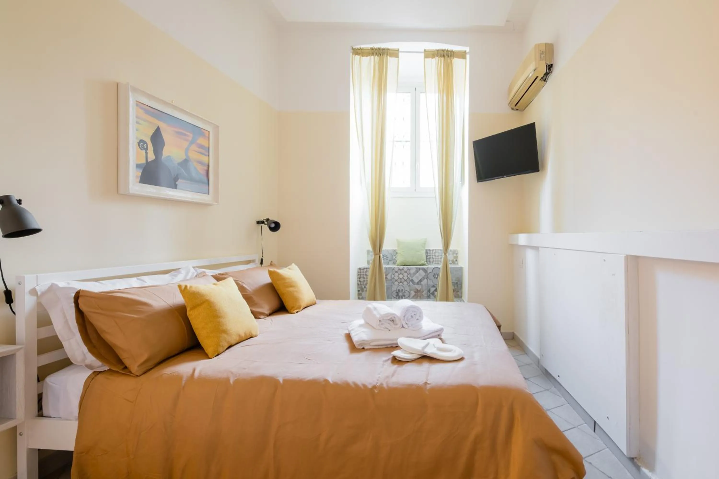 TV and multimedia, Bed in Madì Rooms