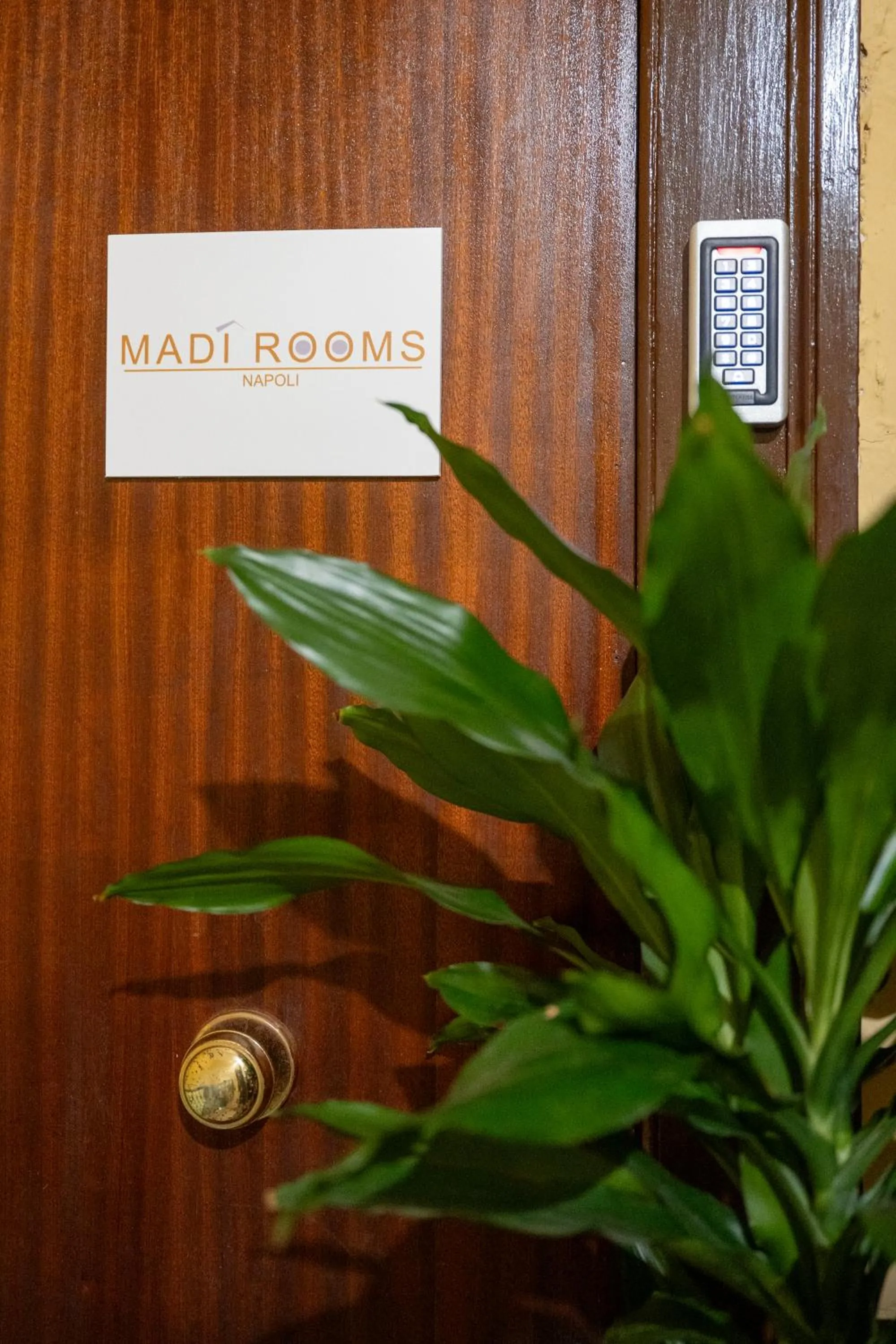 Property logo or sign in Madì Rooms