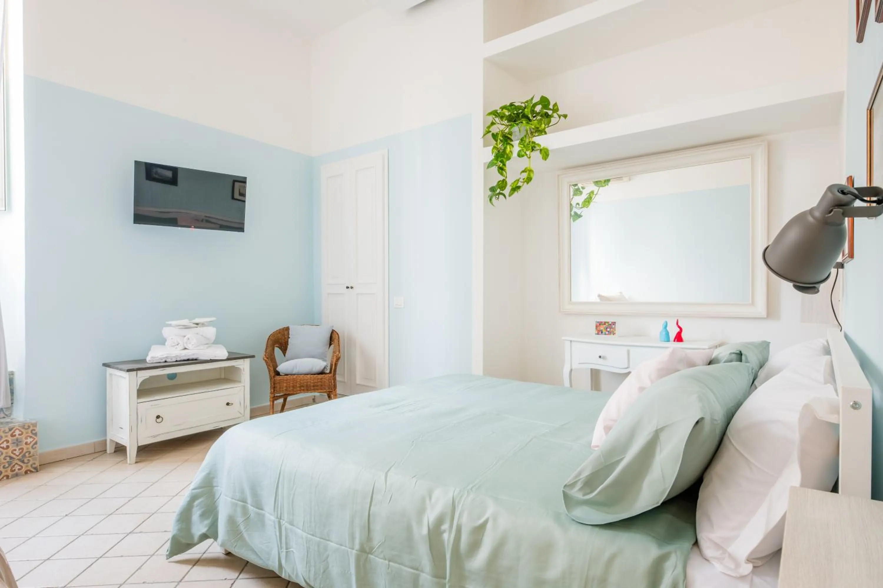 TV and multimedia, Bed in Madì Rooms