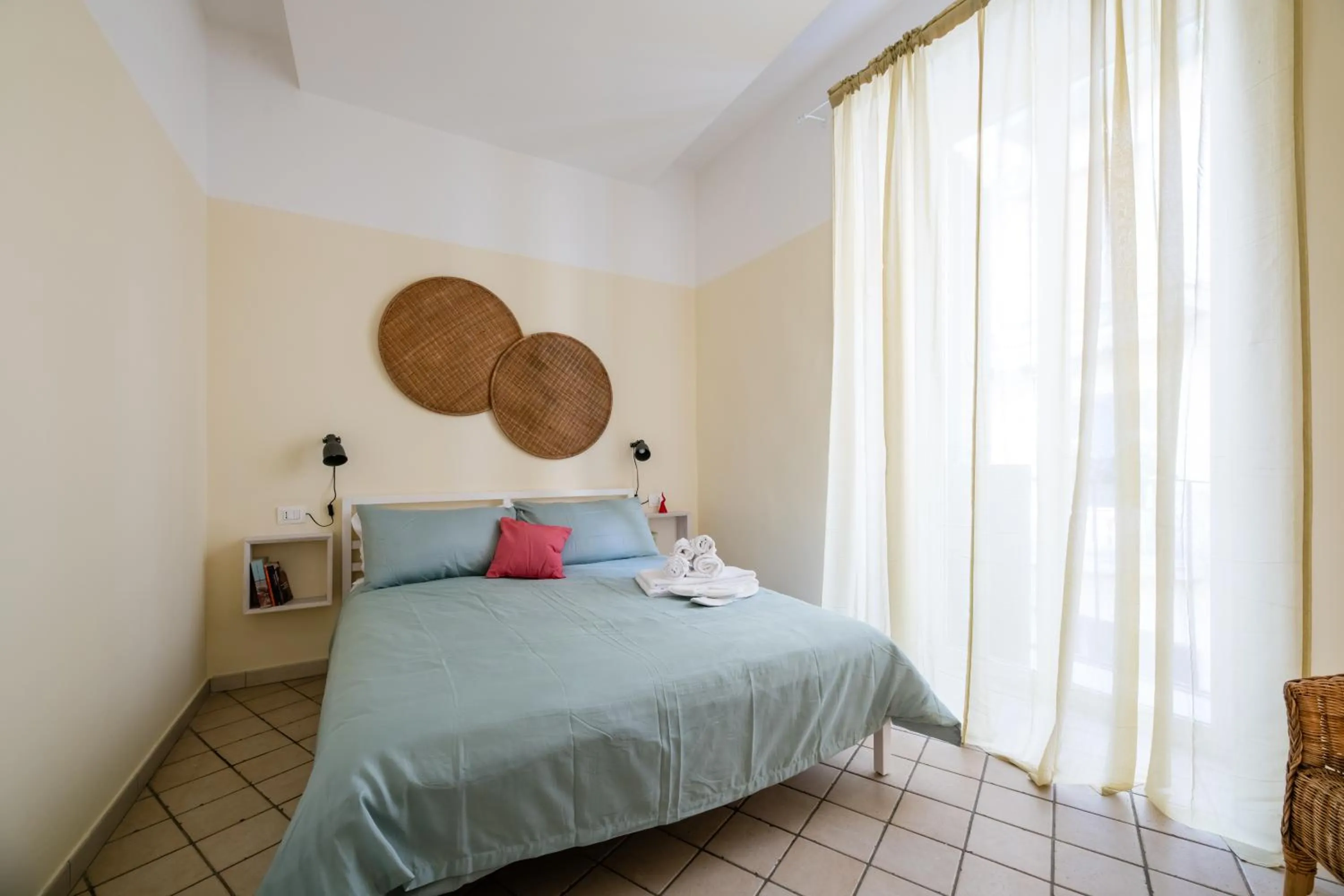 Bed in Madì Rooms