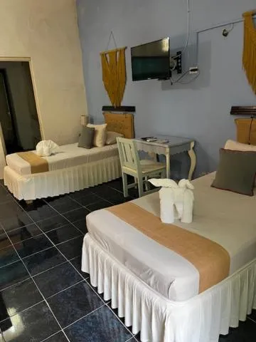 Bed in Casa Aluxes Hotel