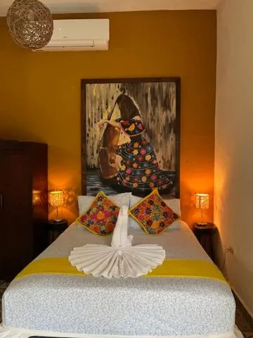 Bed in Casa Aluxes Hotel