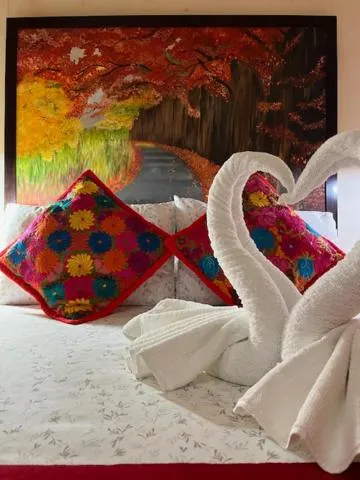 Bed in Casa Aluxes Hotel