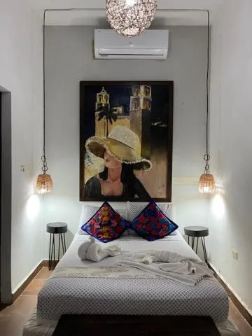 Bed in Casa Aluxes Hotel