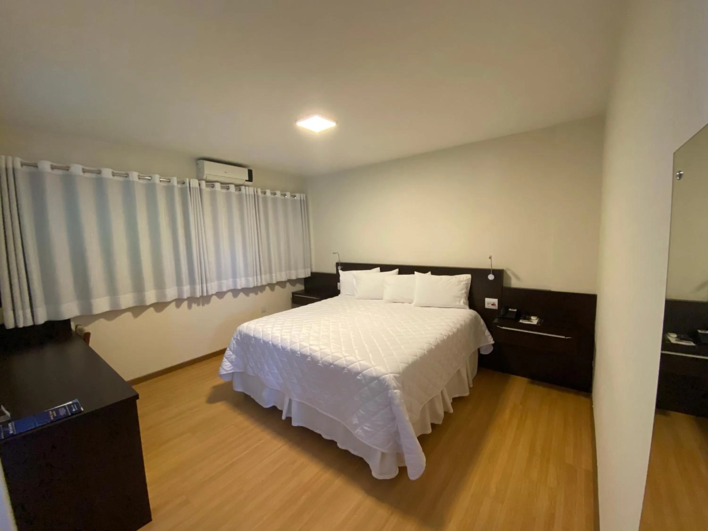 Bed in HD Plaza Hotel