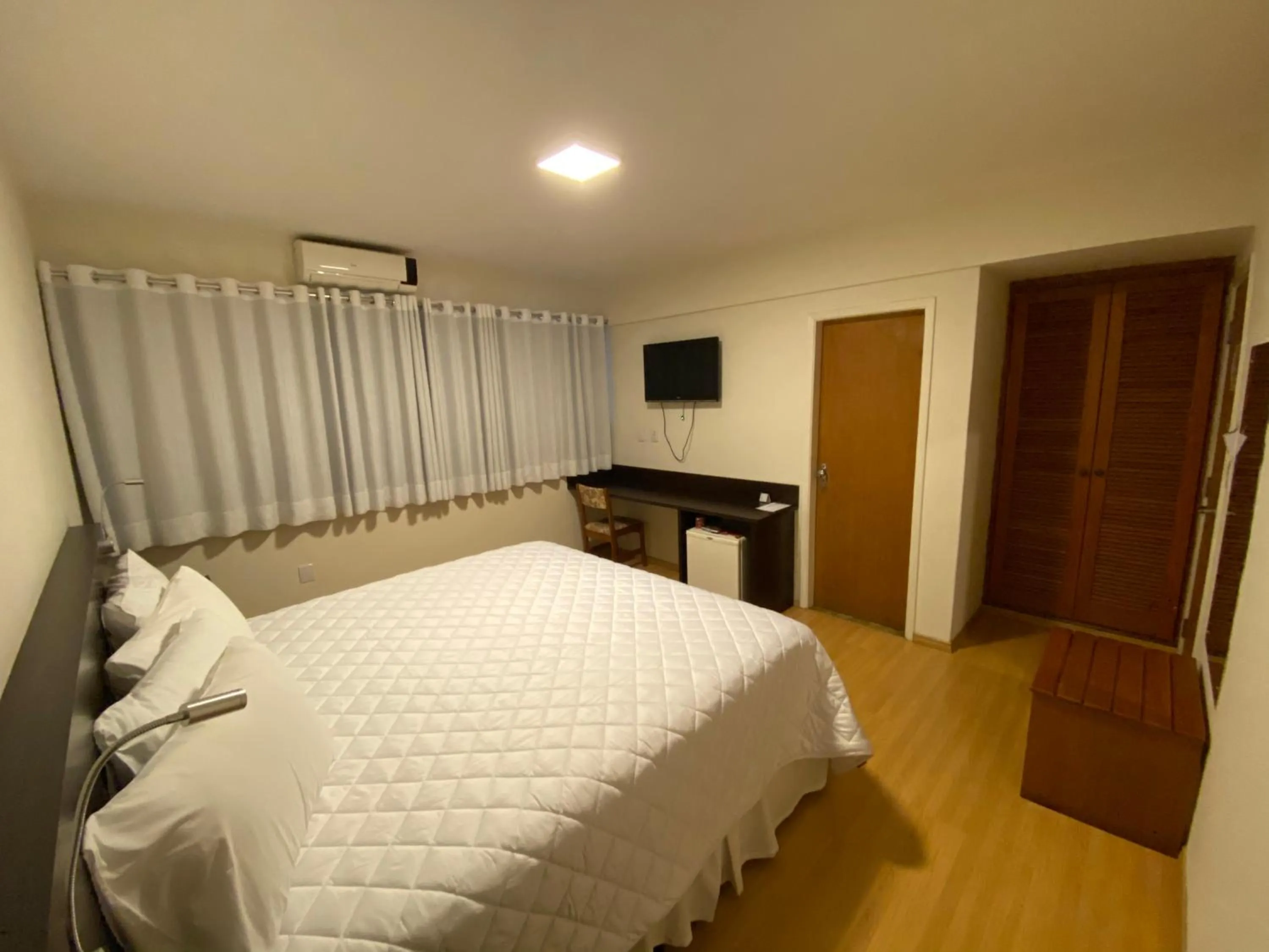 Bed in HD Plaza Hotel