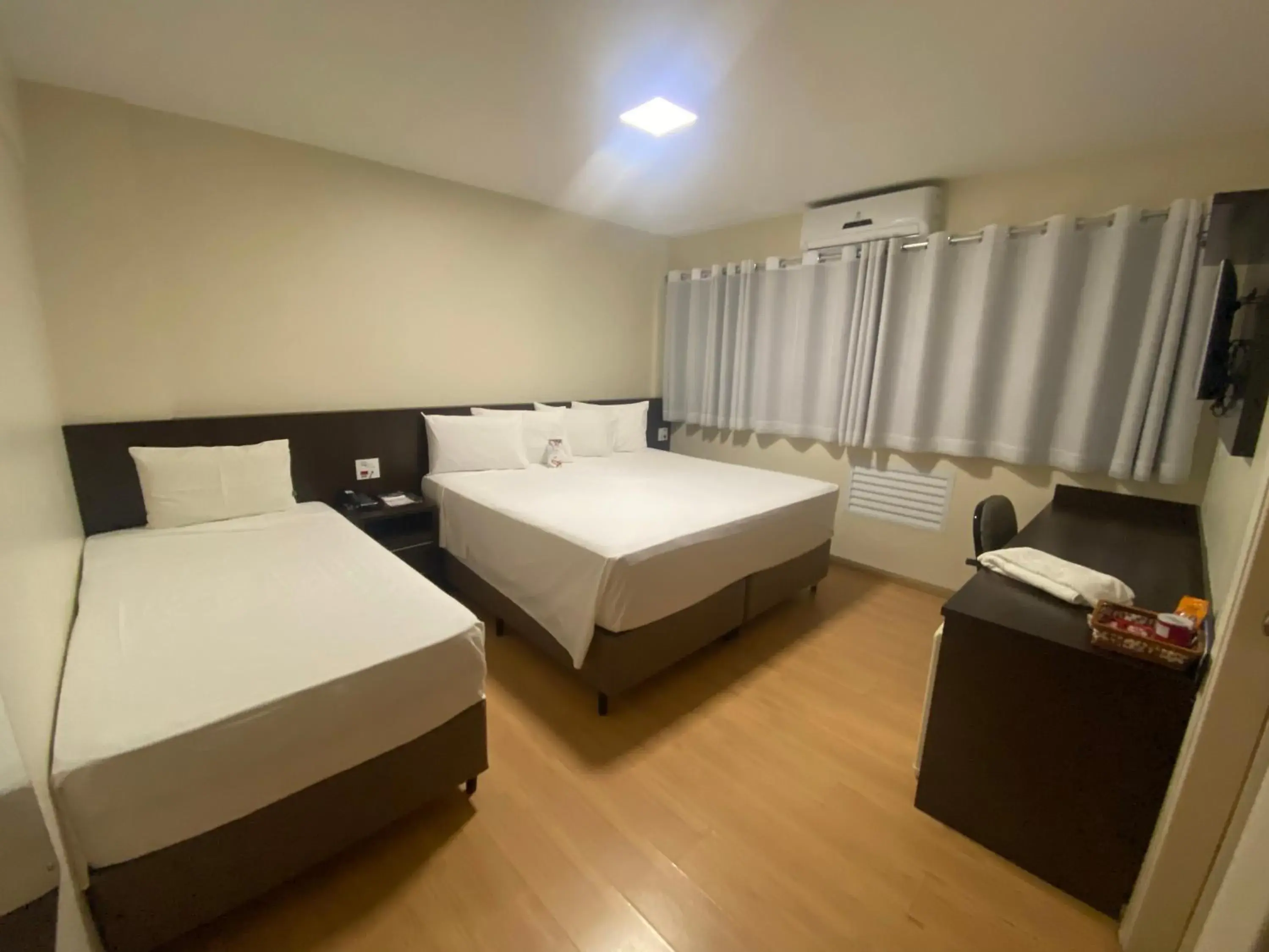 Bed in HD Plaza Hotel Bed in HD Plaza Hotel