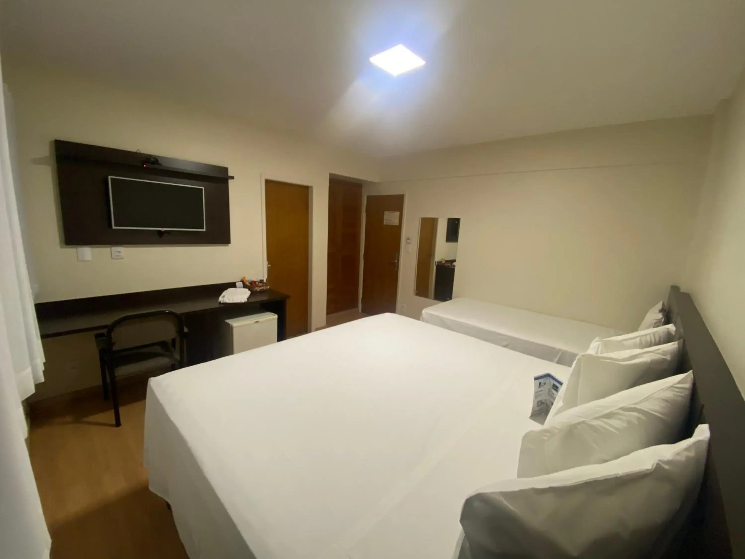 Bed in HD Plaza Hotel Bed in HD Plaza Hotel