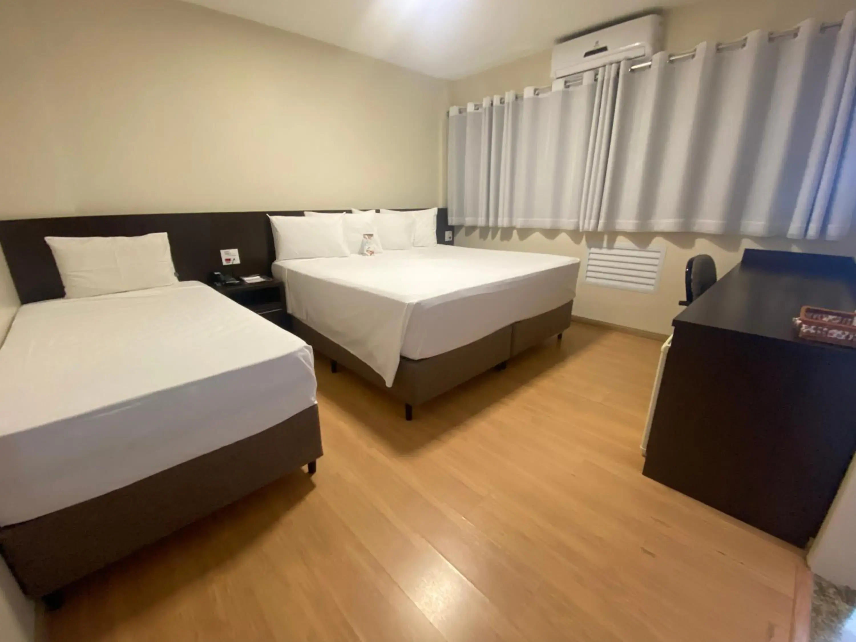 Bed in HD Plaza Hotel Bed in HD Plaza Hotel