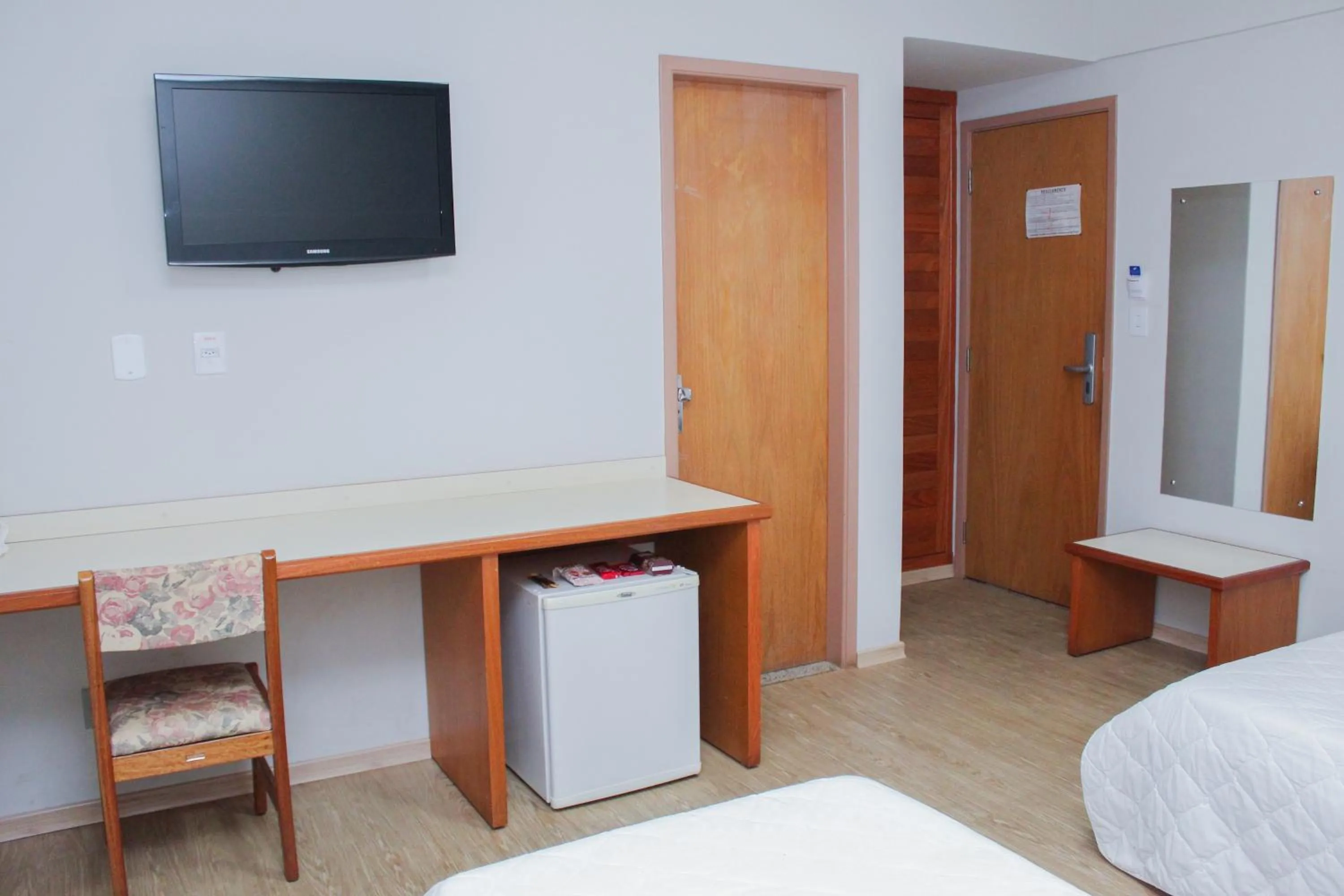 Bed in HD Plaza Hotel