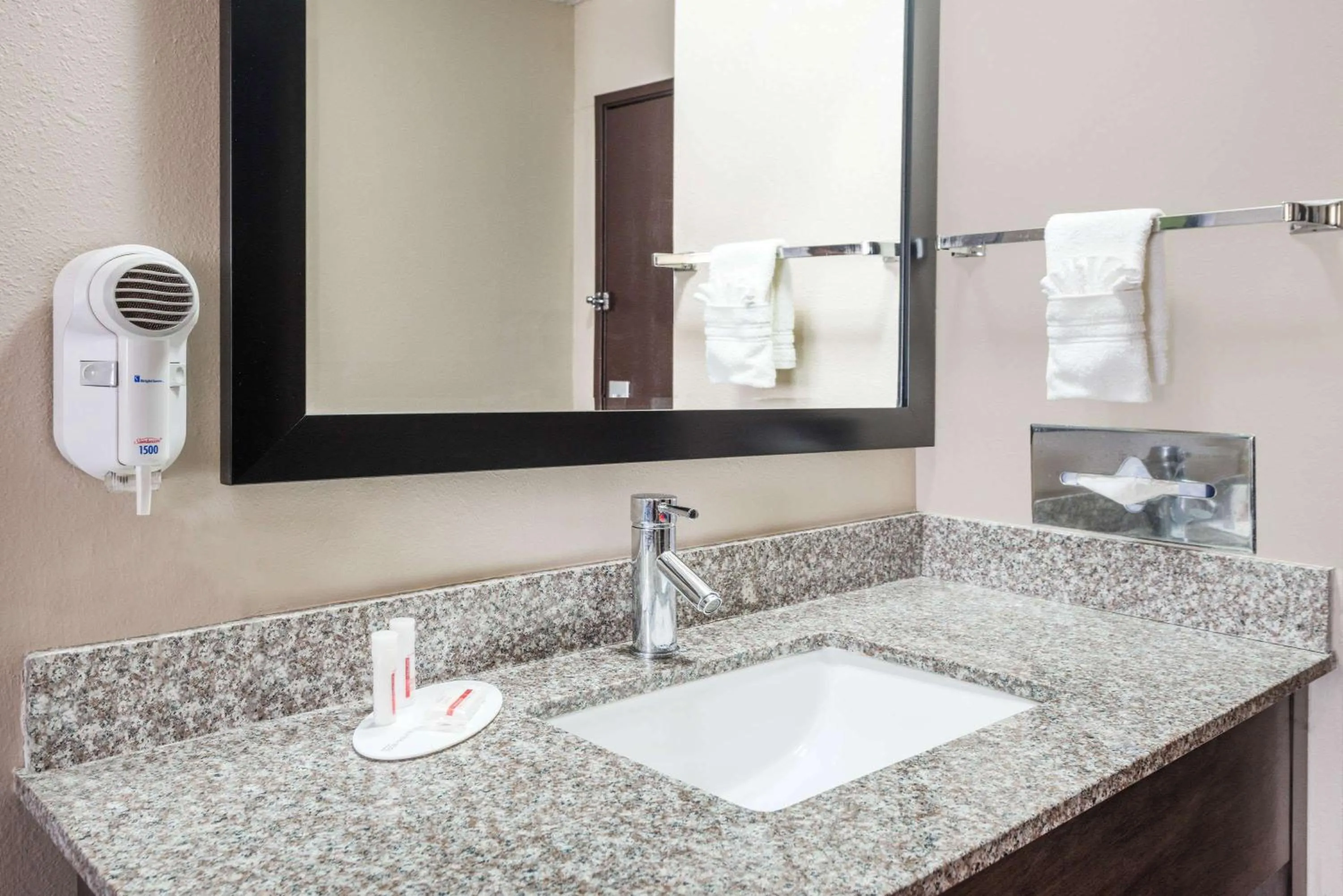 Bathroom in Super 8 by Wyndham Warrensburg