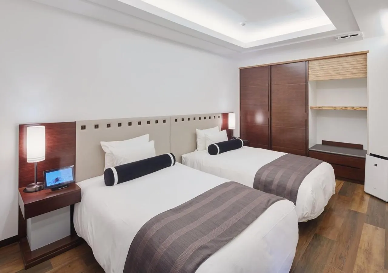 Bed in Ala Mahaina Condo Hotel