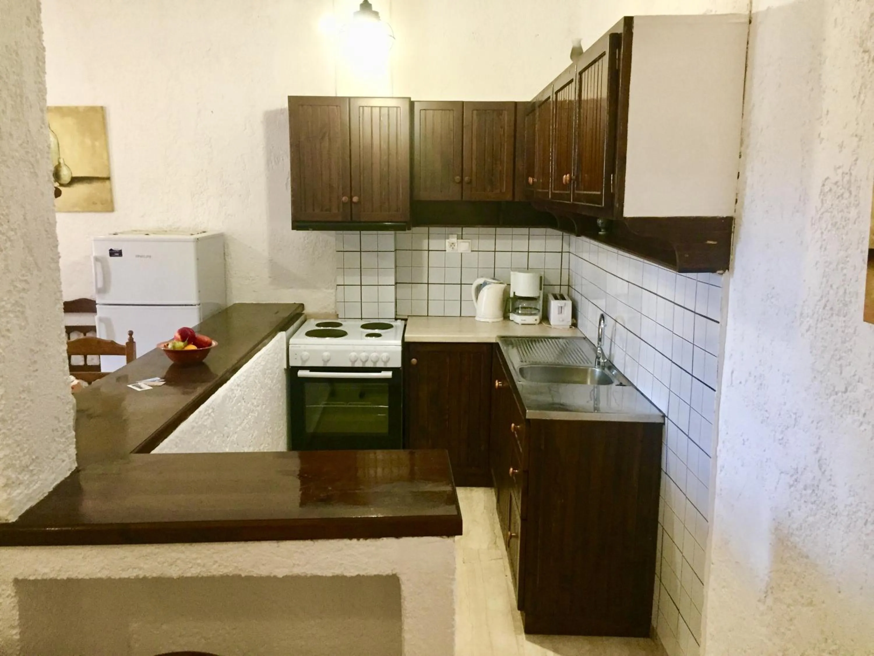 Kitchen or kitchenette in Filoxenia Villa