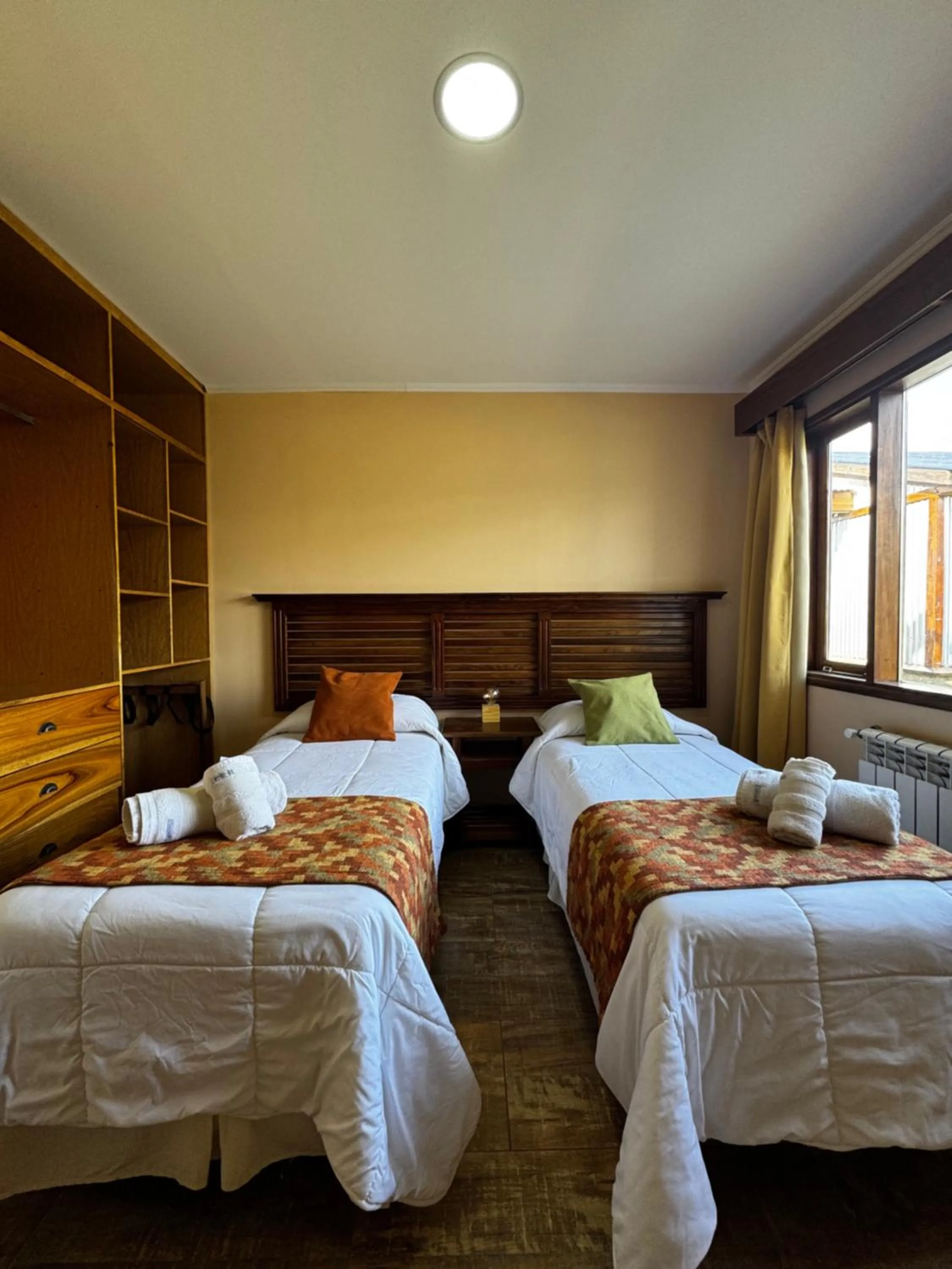 Bed in Patagonia Austral Suites