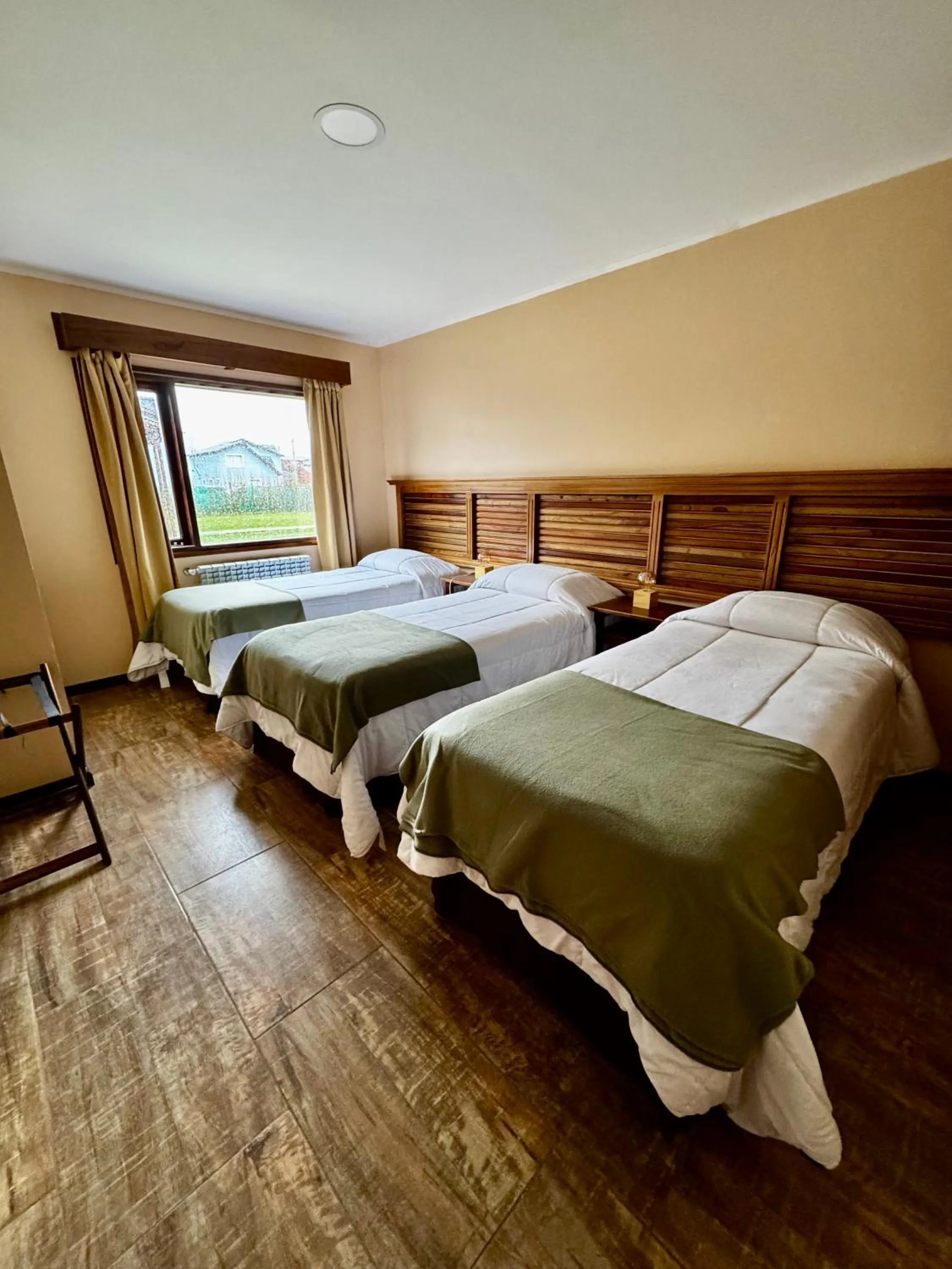 Bed in Patagonia Austral Suites