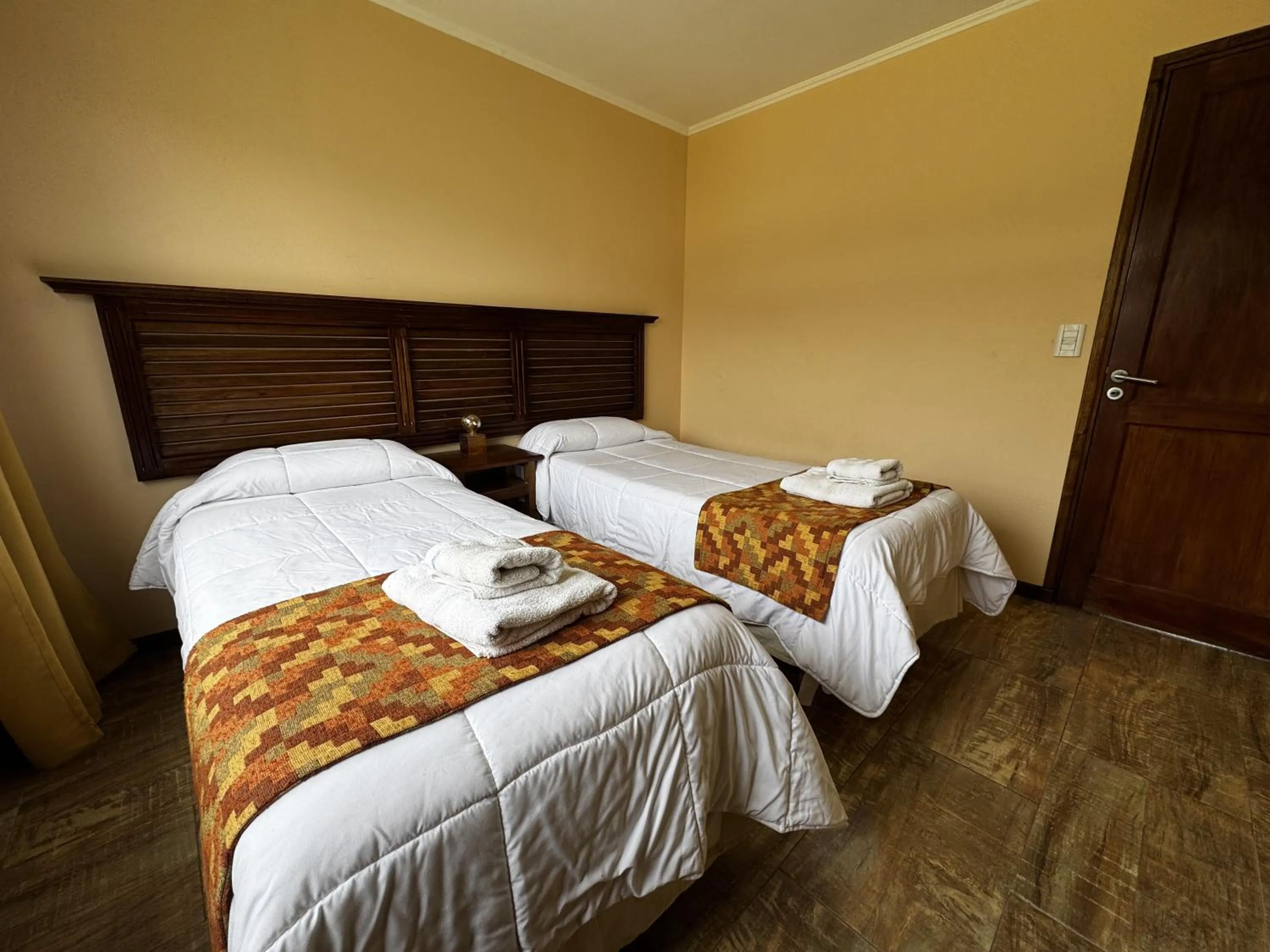 Bed in Patagonia Austral Suites