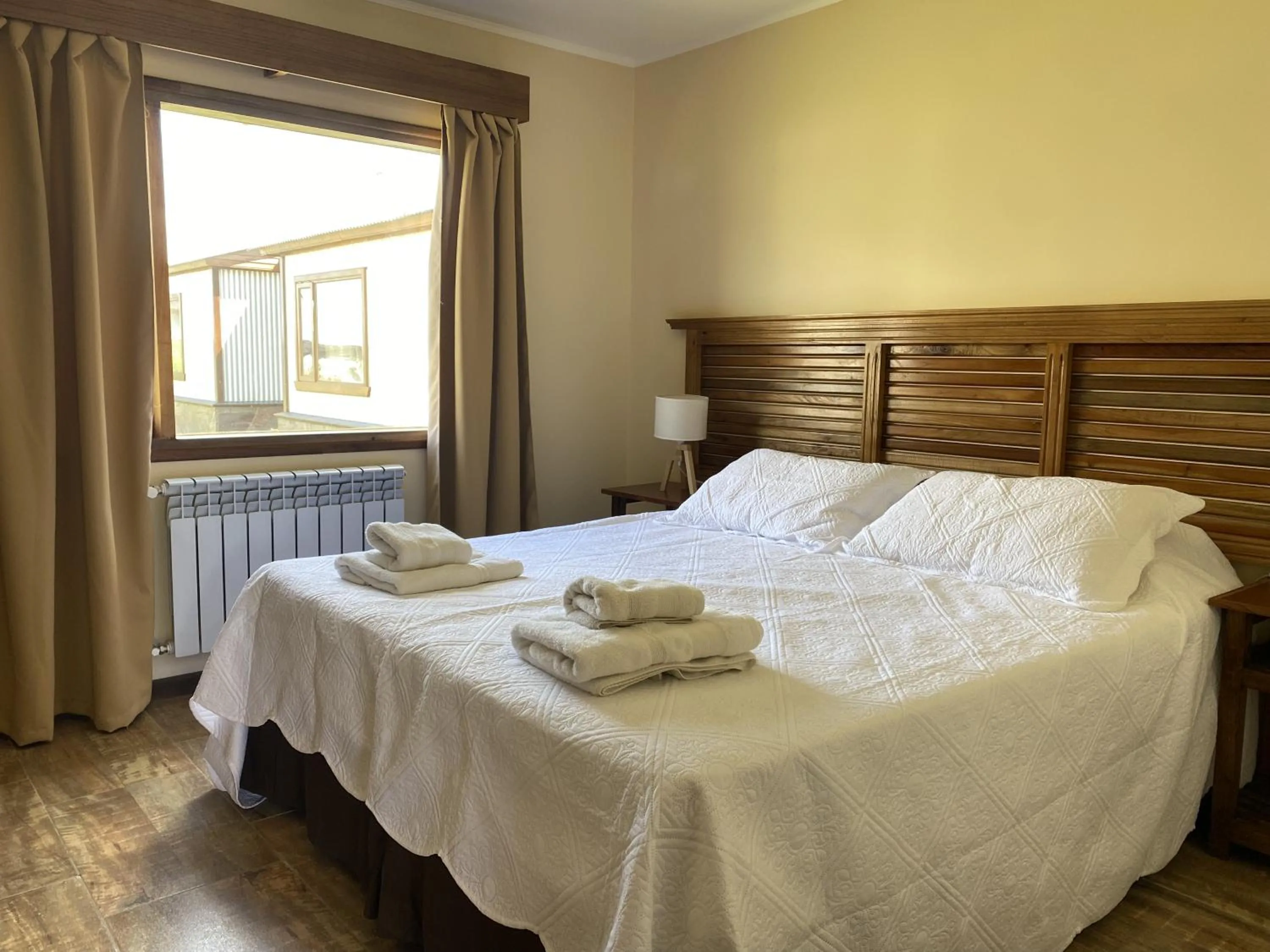 Bed in Patagonia Austral Suites