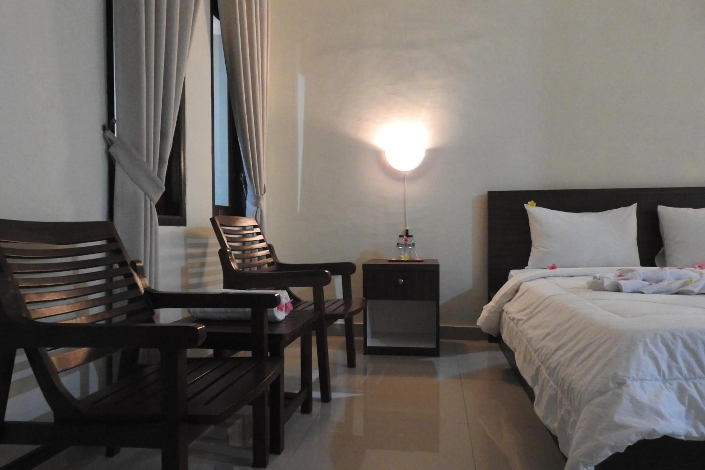 Living room, Bed in D'Batur Hotel