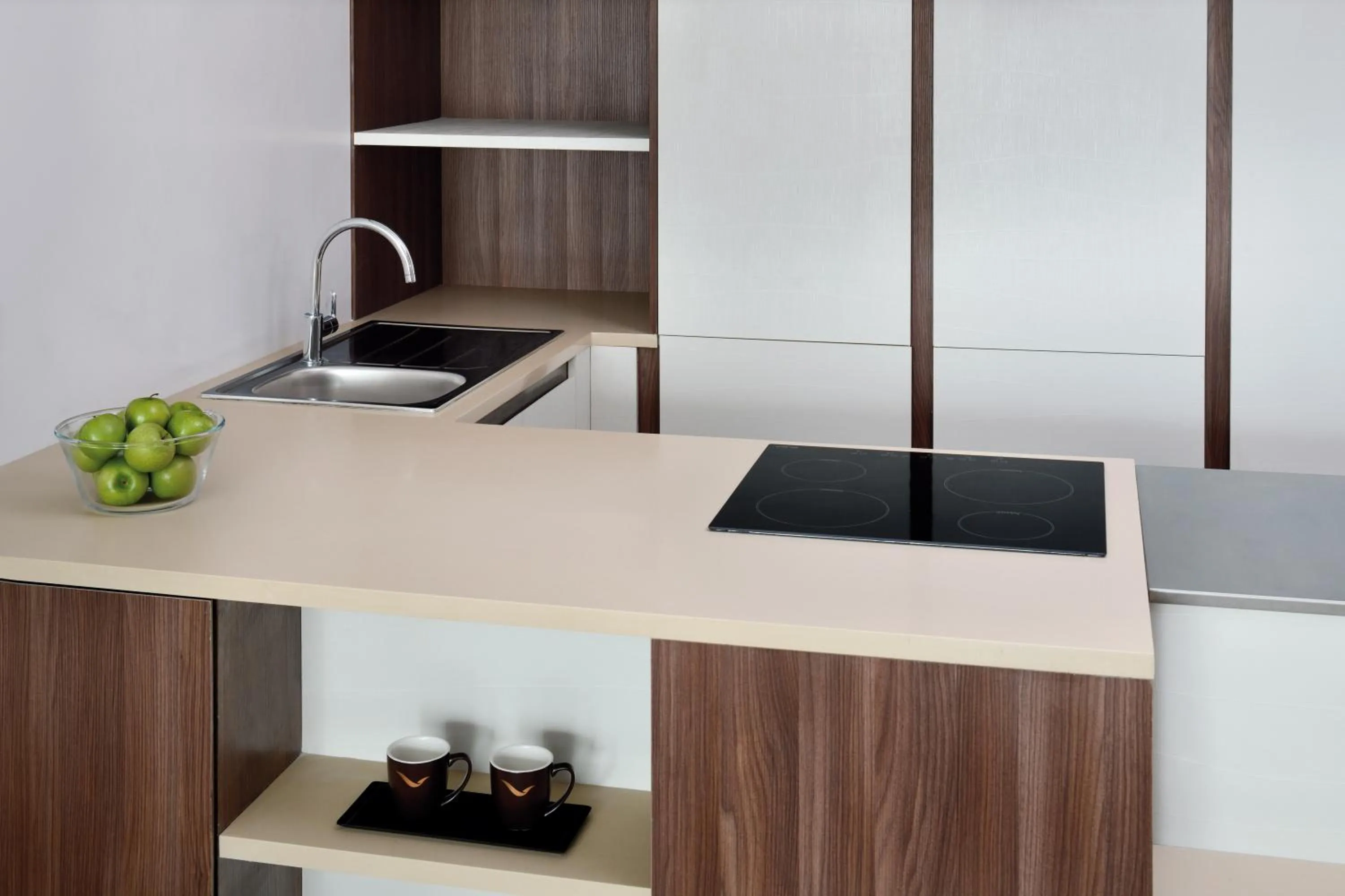 Kitchen or kitchenette in Mövenpick Hotel Apartments Downtown Dubai