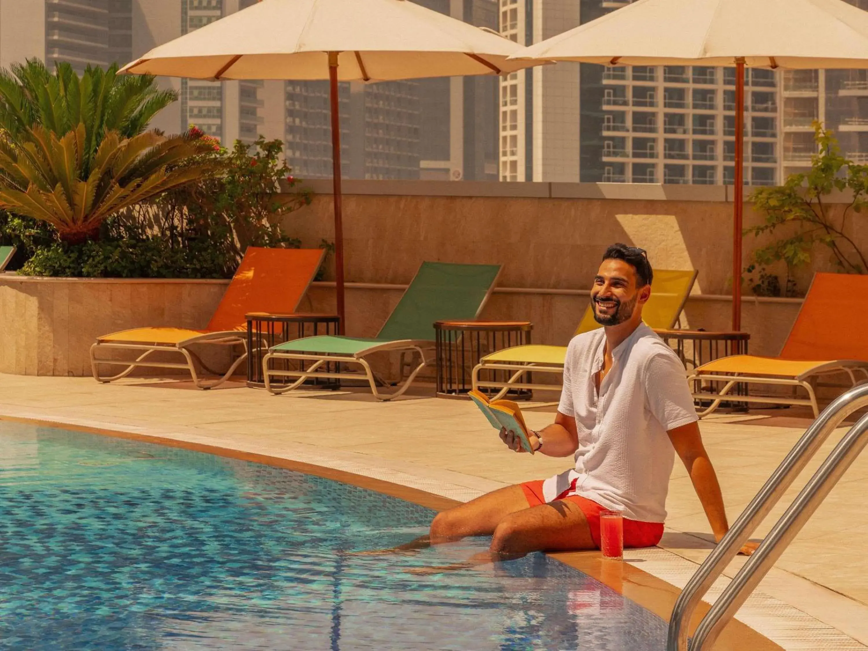 Pool view in Mövenpick Hotel Apartments Downtown Dubai Pool view in Mövenpick Hotel Apartments Downtown Dubai