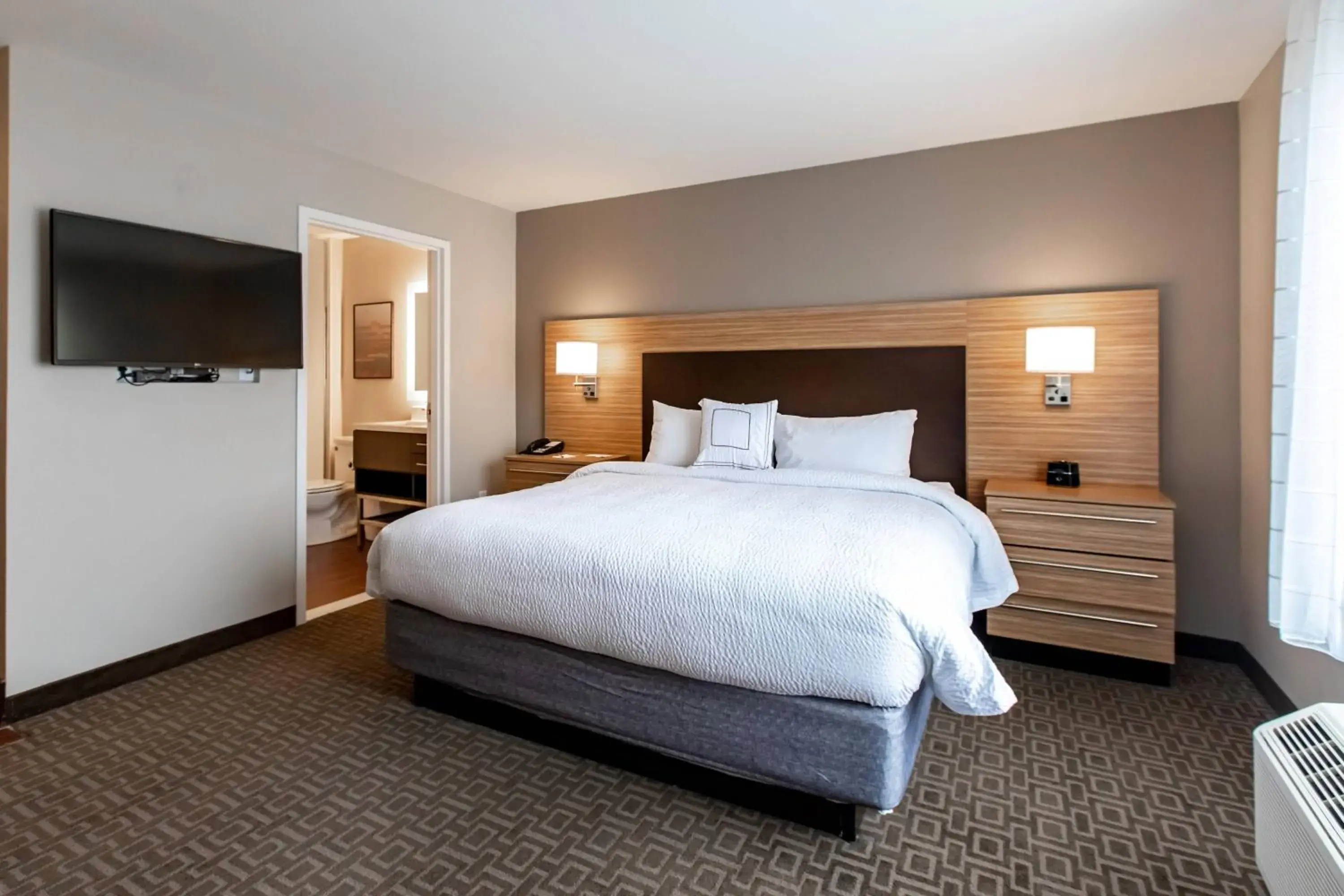 One Bedroom Suite with a Queen Bed and a Sofa in TownePlace Suites by Marriott Louisville Airport One Bedroom Suite with a Queen Bed and a Sofa in TownePlace Suites by Marriott Louisville Airport