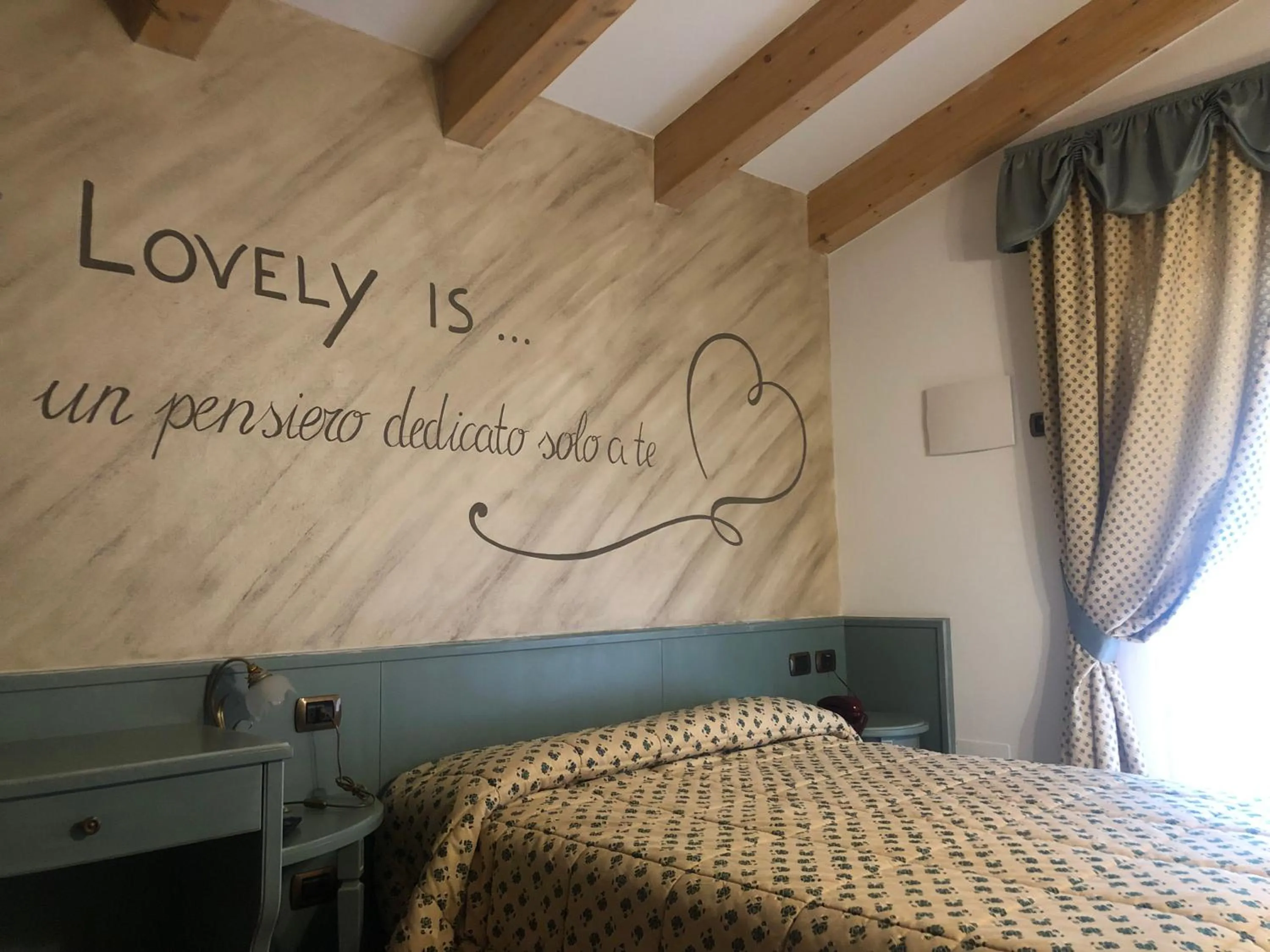 Bed in Cavallino Lovely Hotel