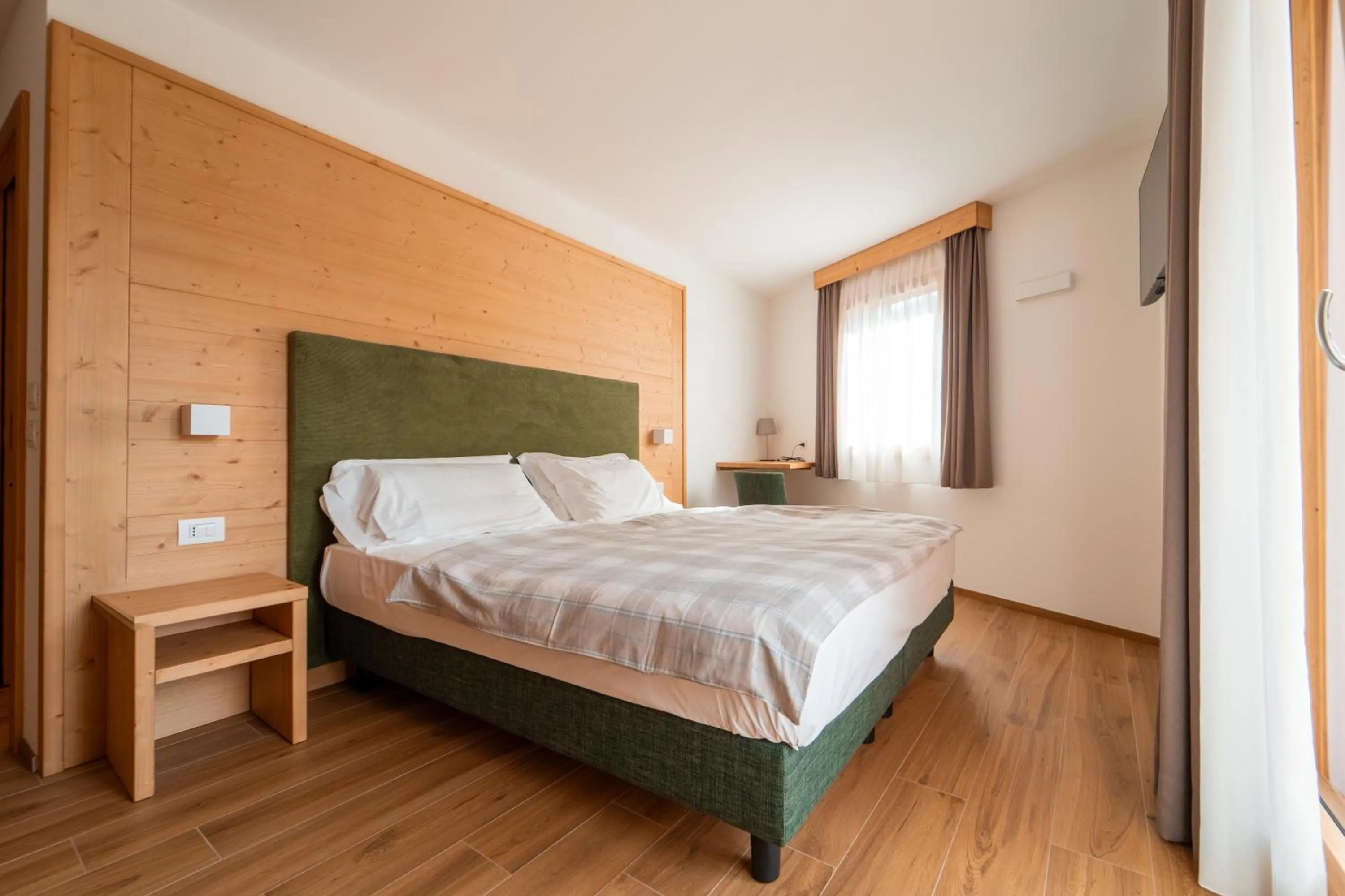 Bed in Dolomiti Hotel Cozzio