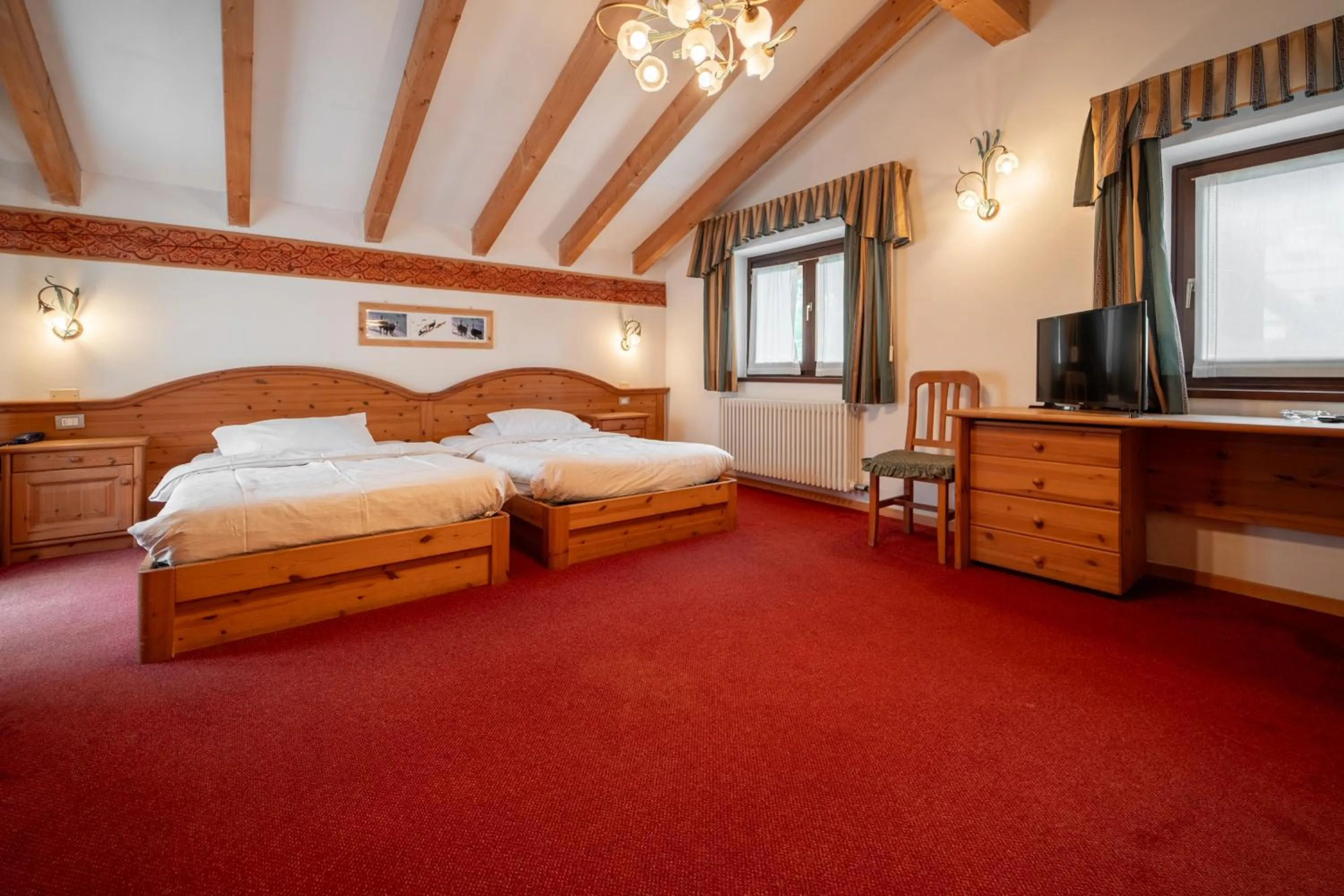 Bed in Dolomiti Hotel Cozzio