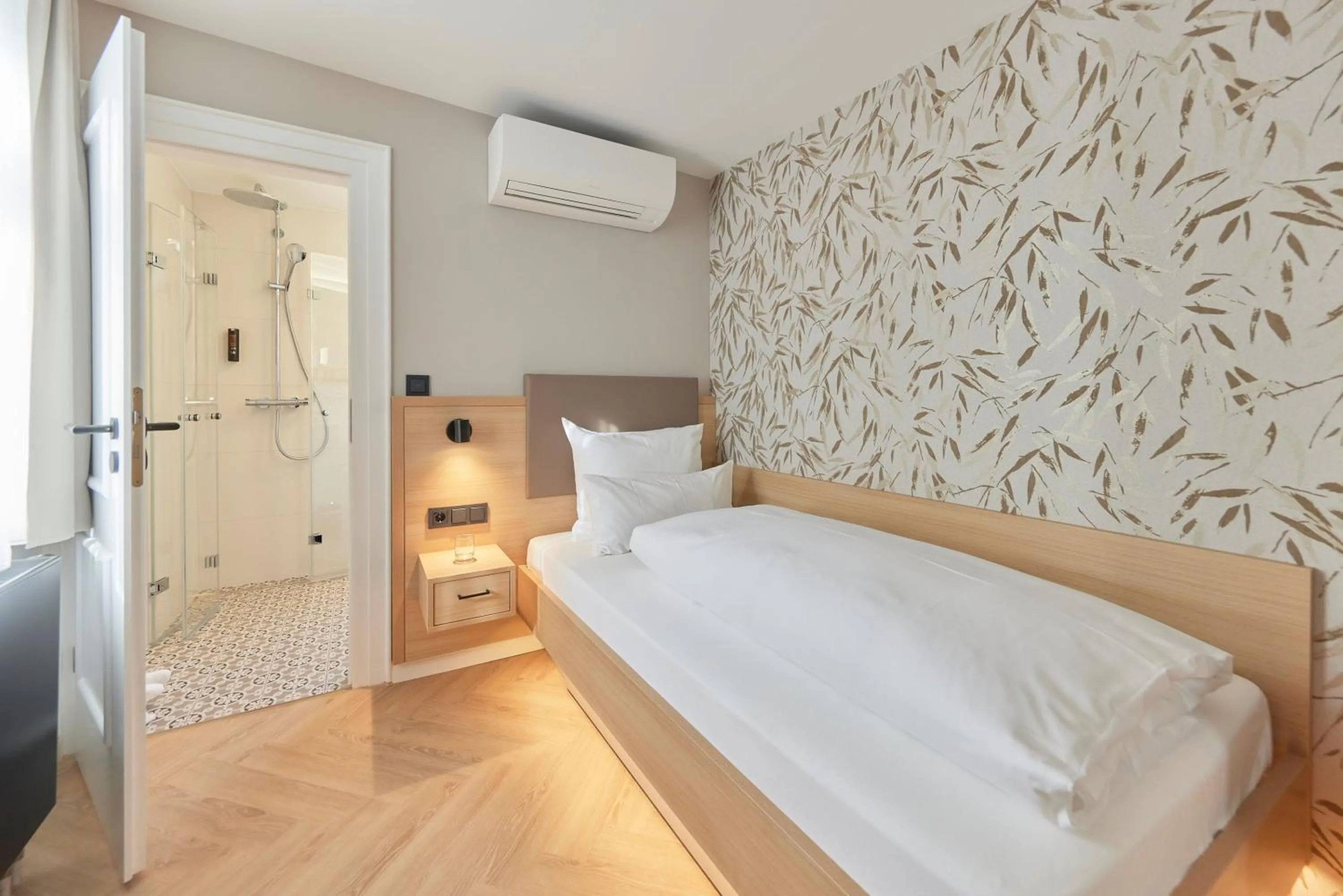 Bed in Hotel Württemberger Hof