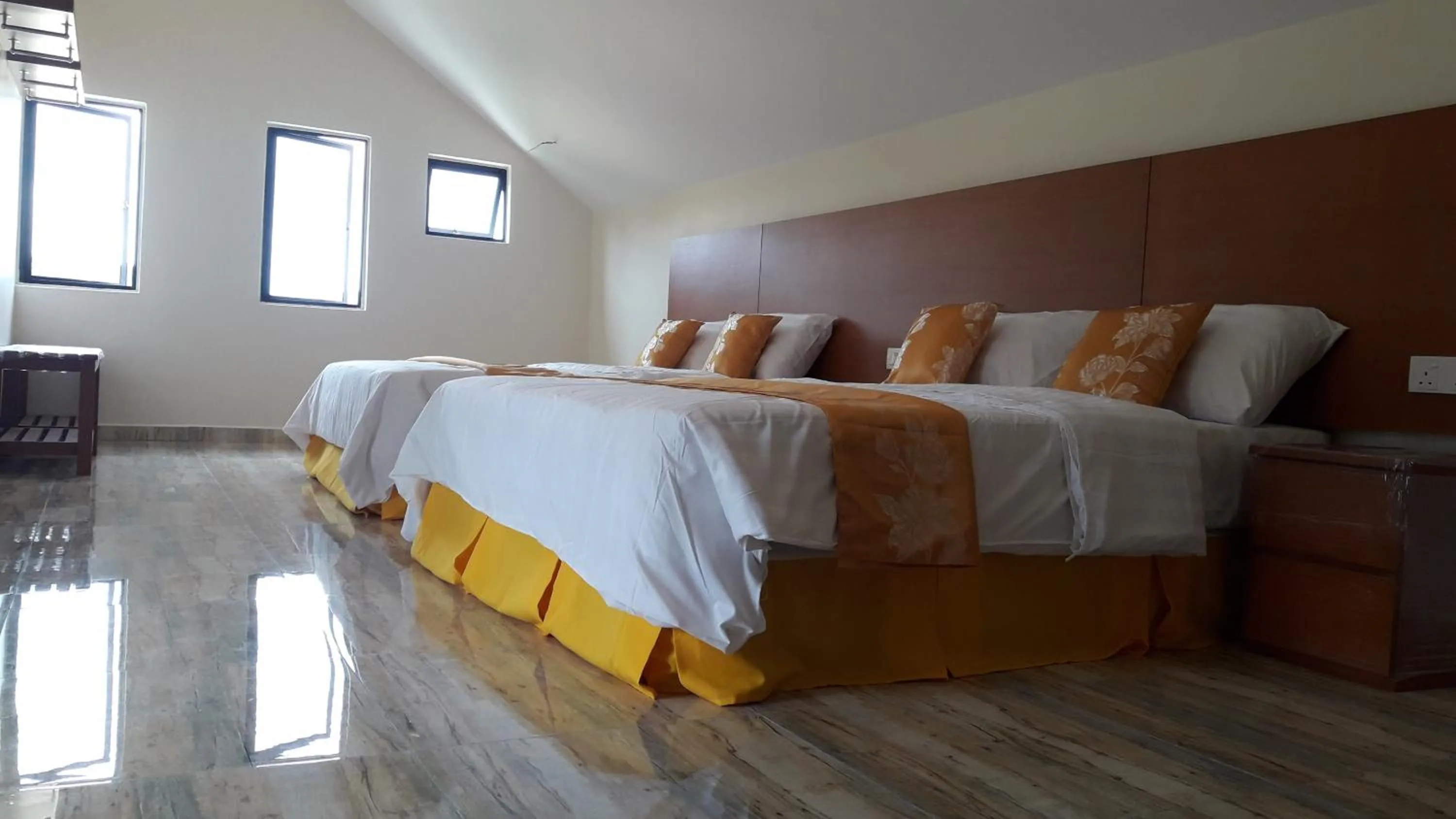 Bed in TULIP HOTEL & APARTMENT