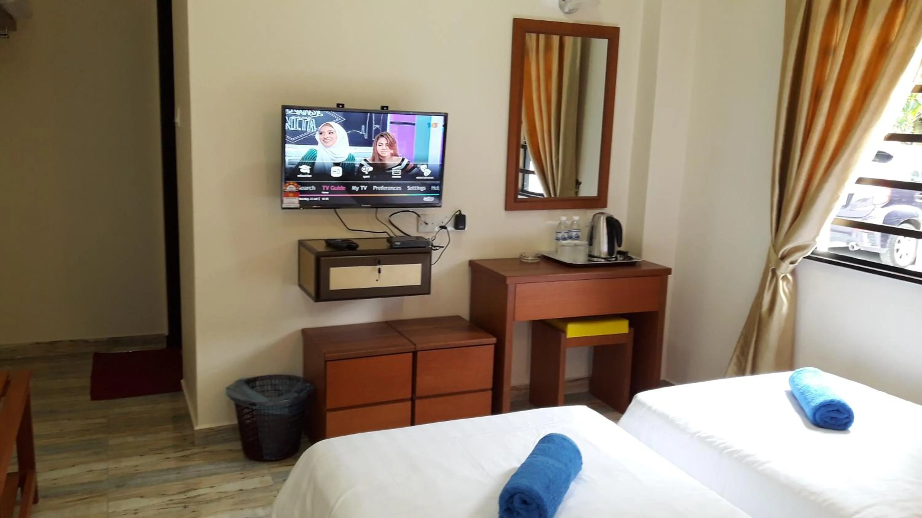 Bed in TULIP HOTEL & APARTMENT