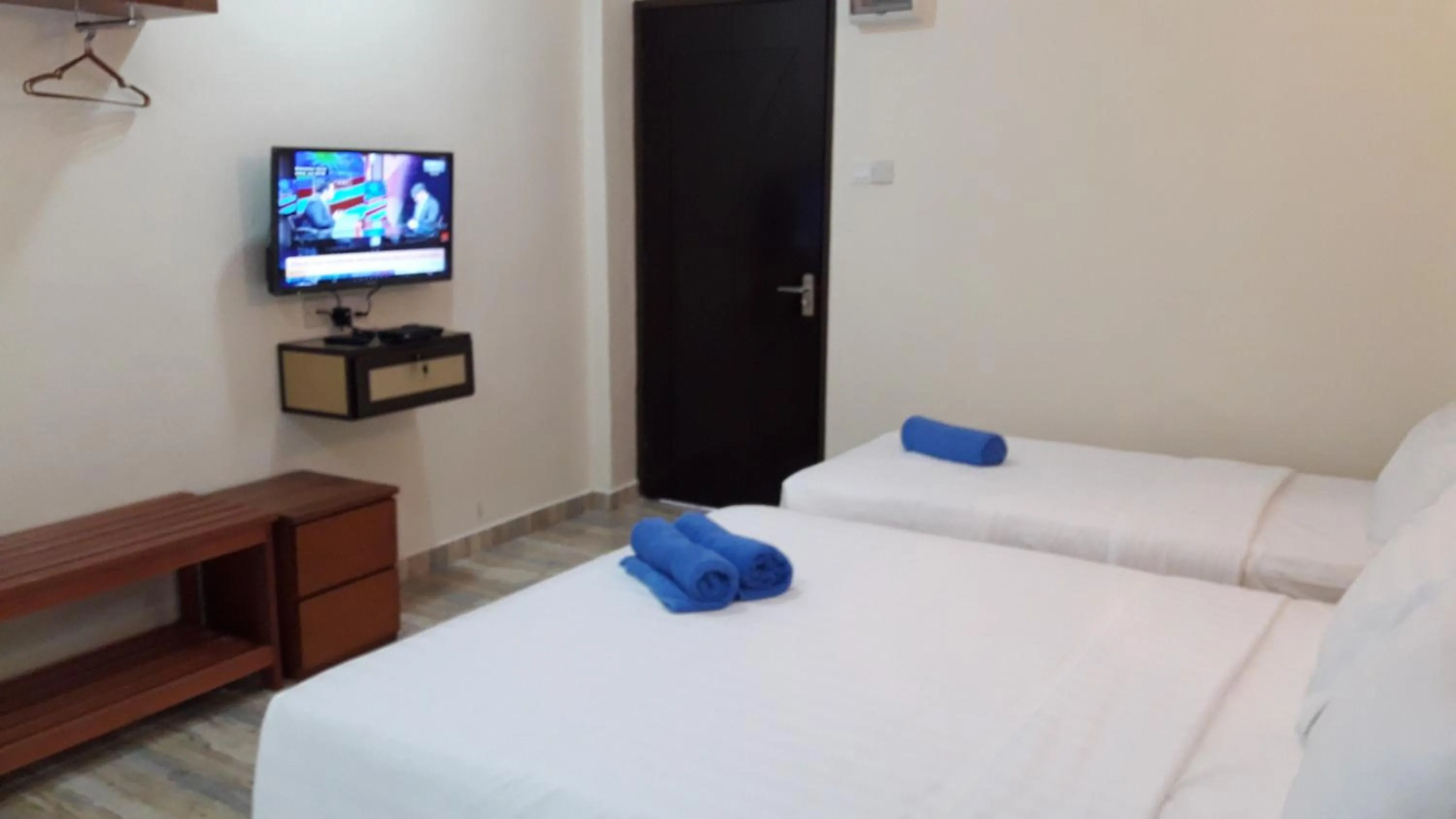 Bed in TULIP HOTEL & APARTMENT