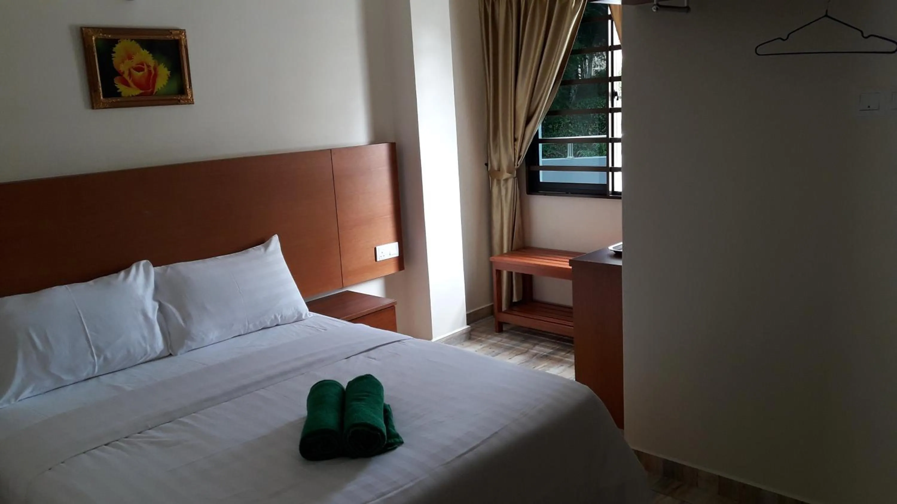 Bed in TULIP HOTEL & APARTMENT