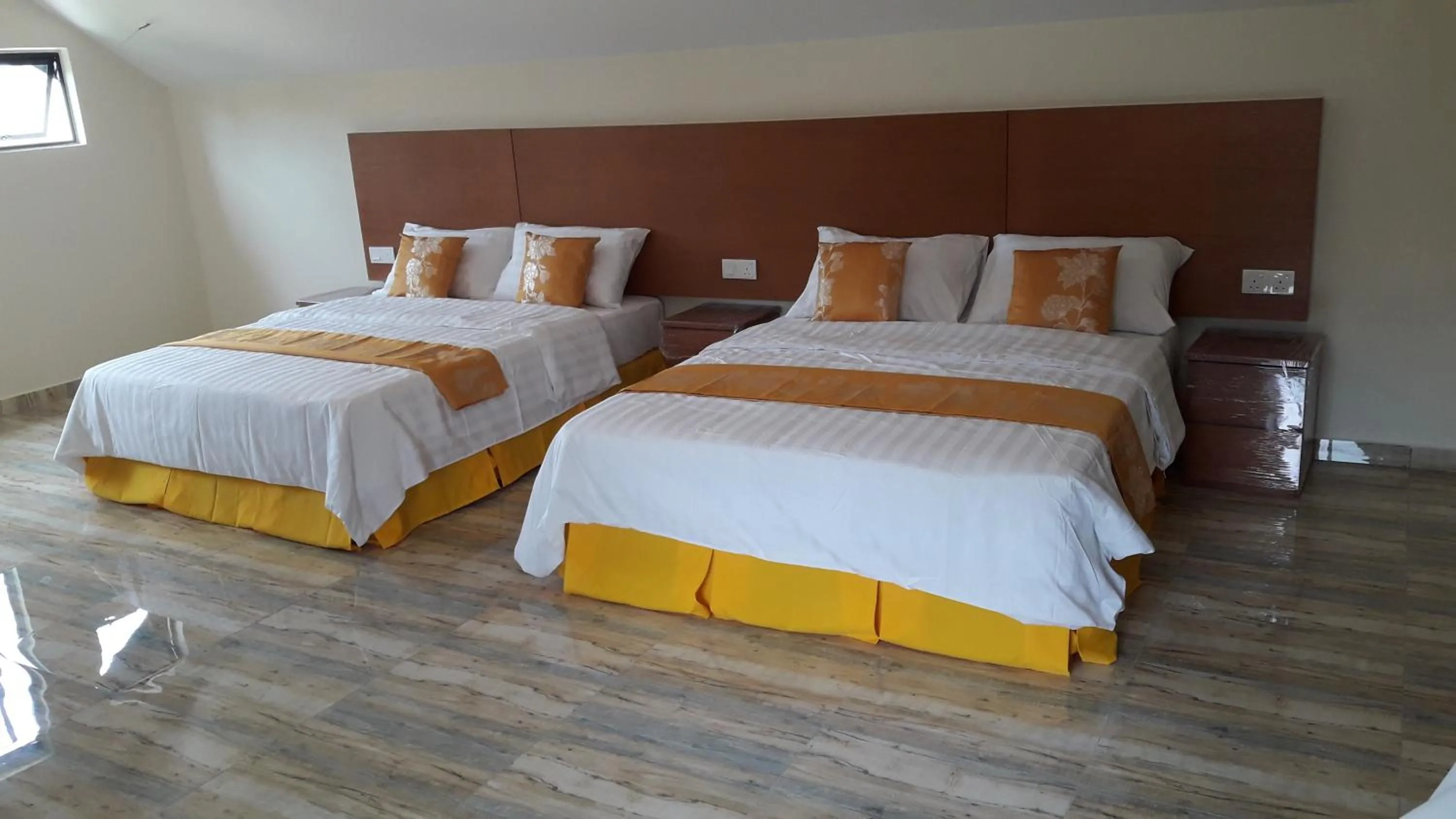 Bed in TULIP HOTEL & APARTMENT
