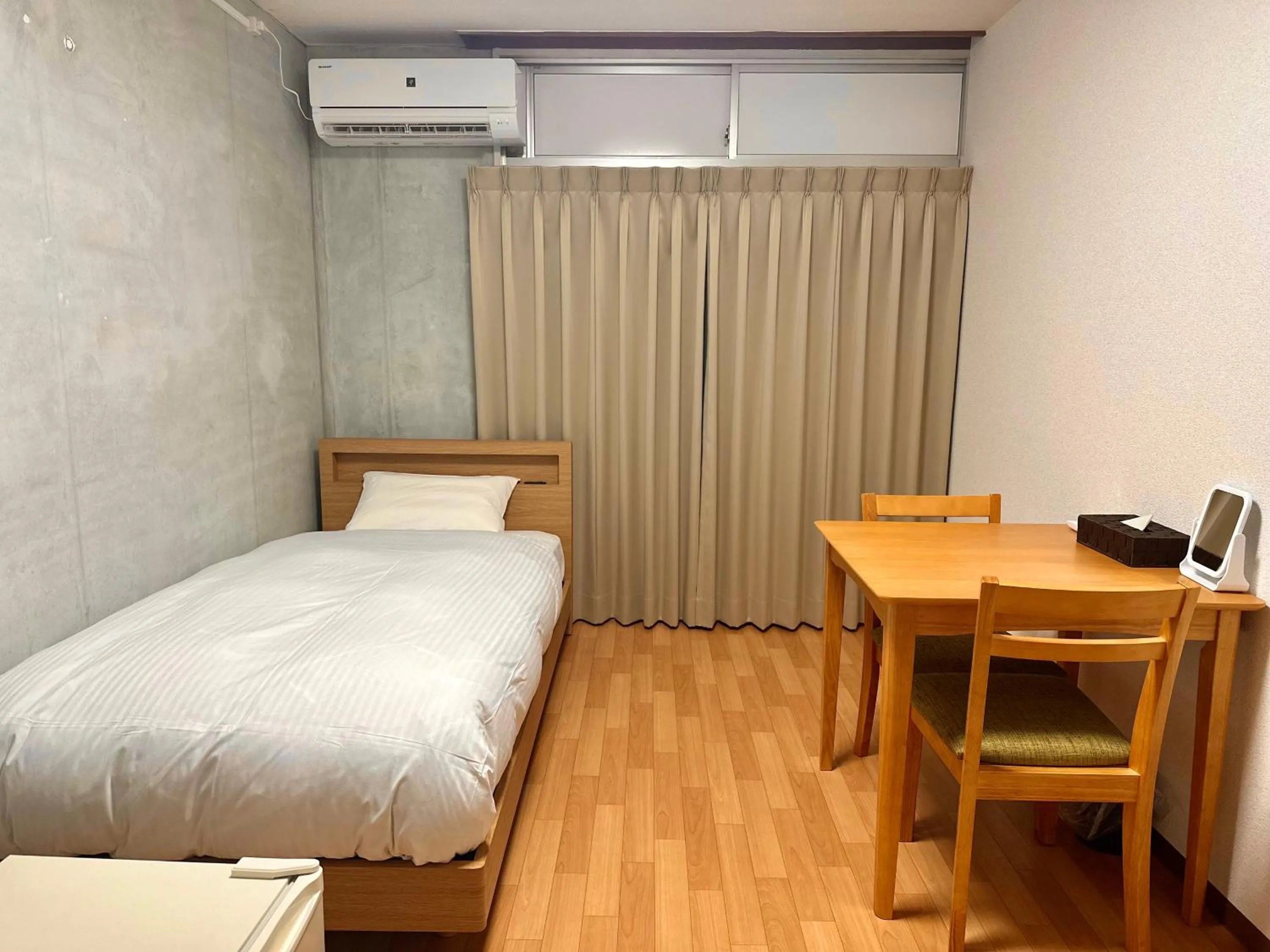 Photo of the whole room, Bed in TRAVEL&BOOK HOTEL HULATONCABIN TAKAMATSU