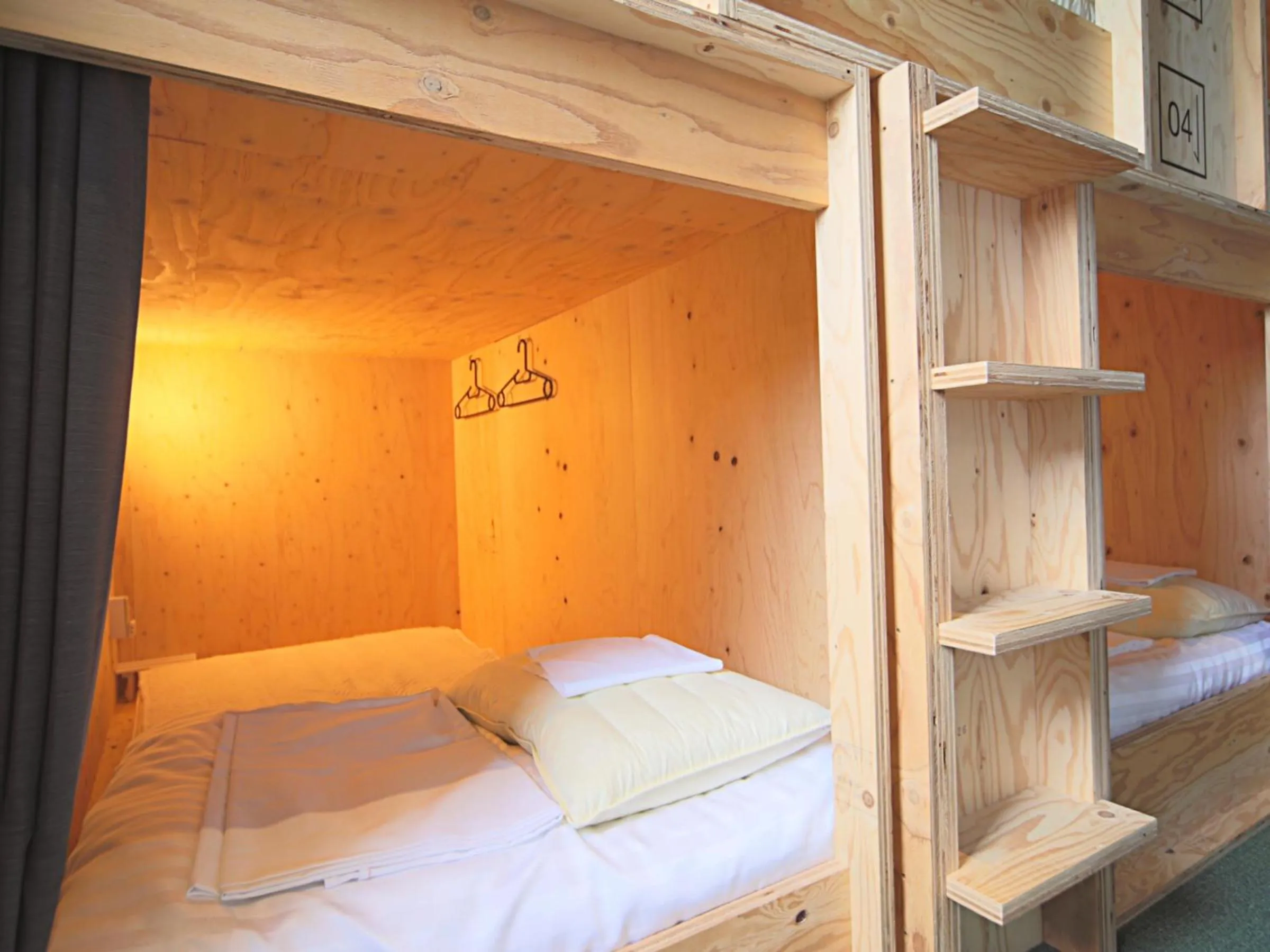 Bed in TRAVEL&BOOK HOTEL HULATONCABIN TAKAMATSU