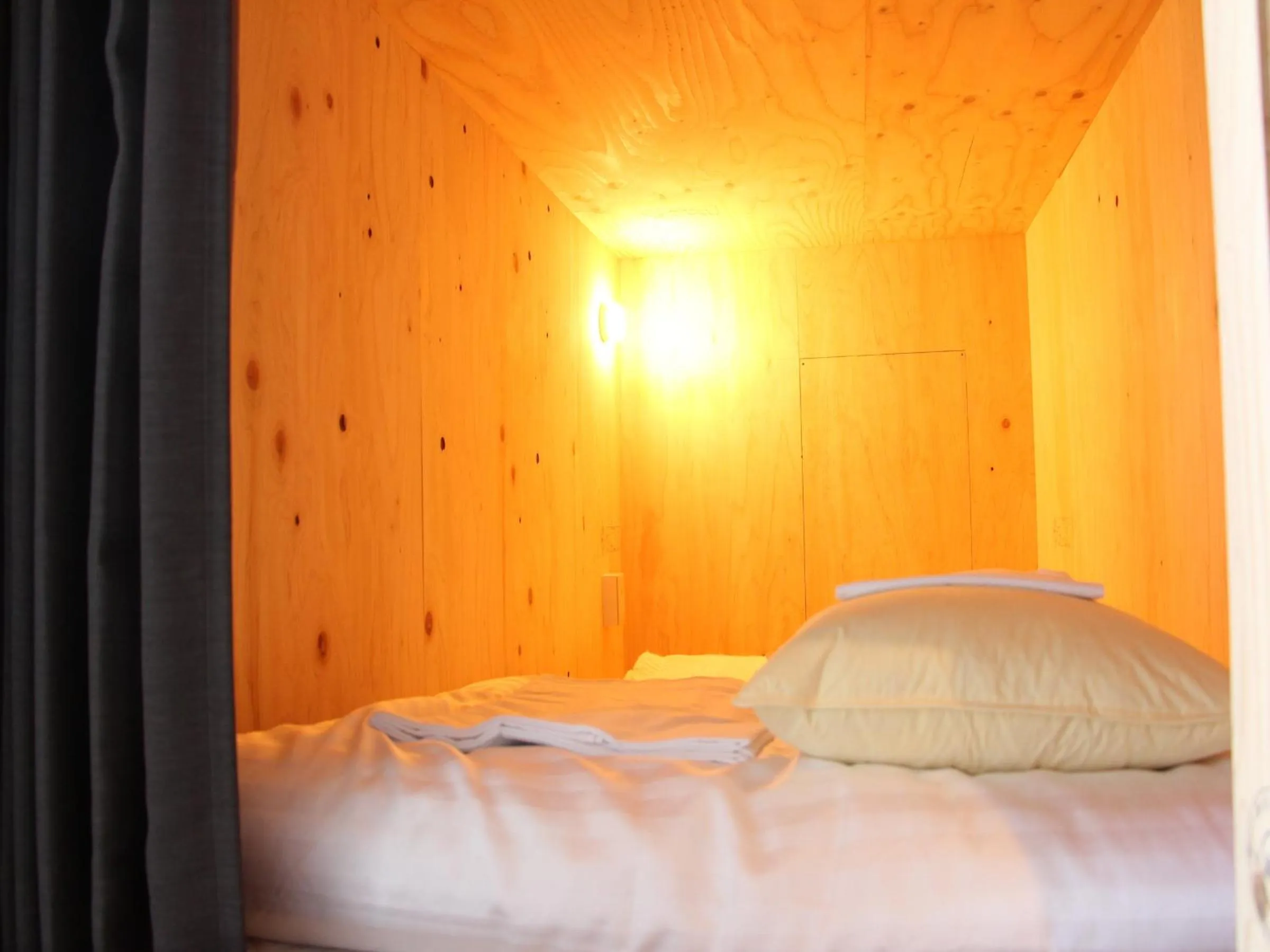 Photo of the whole room, Bed in TRAVEL&BOOK HOTEL HULATONCABIN TAKAMATSU