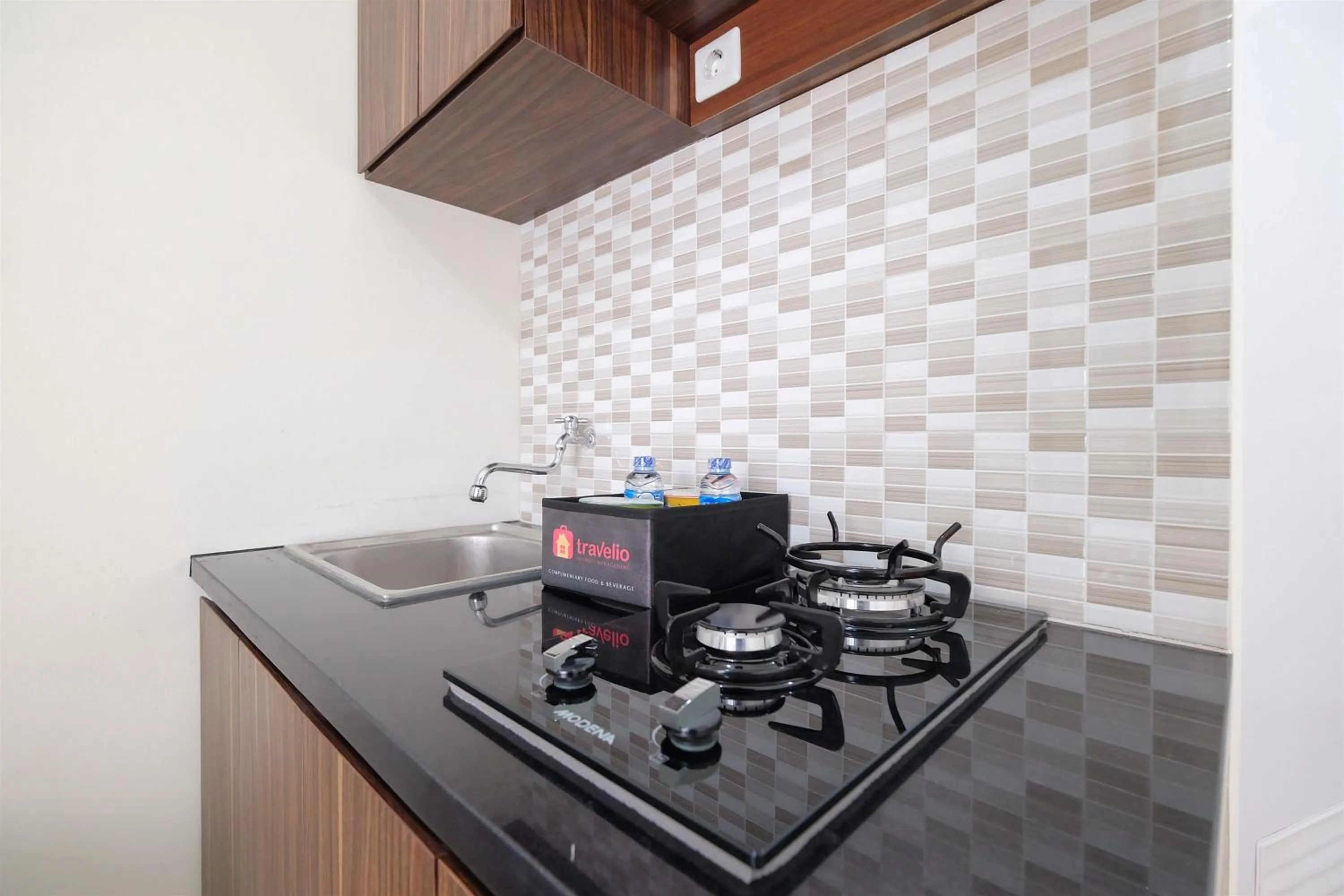 Comfy Studio Apartment @ Green Pramuka City By Travelio