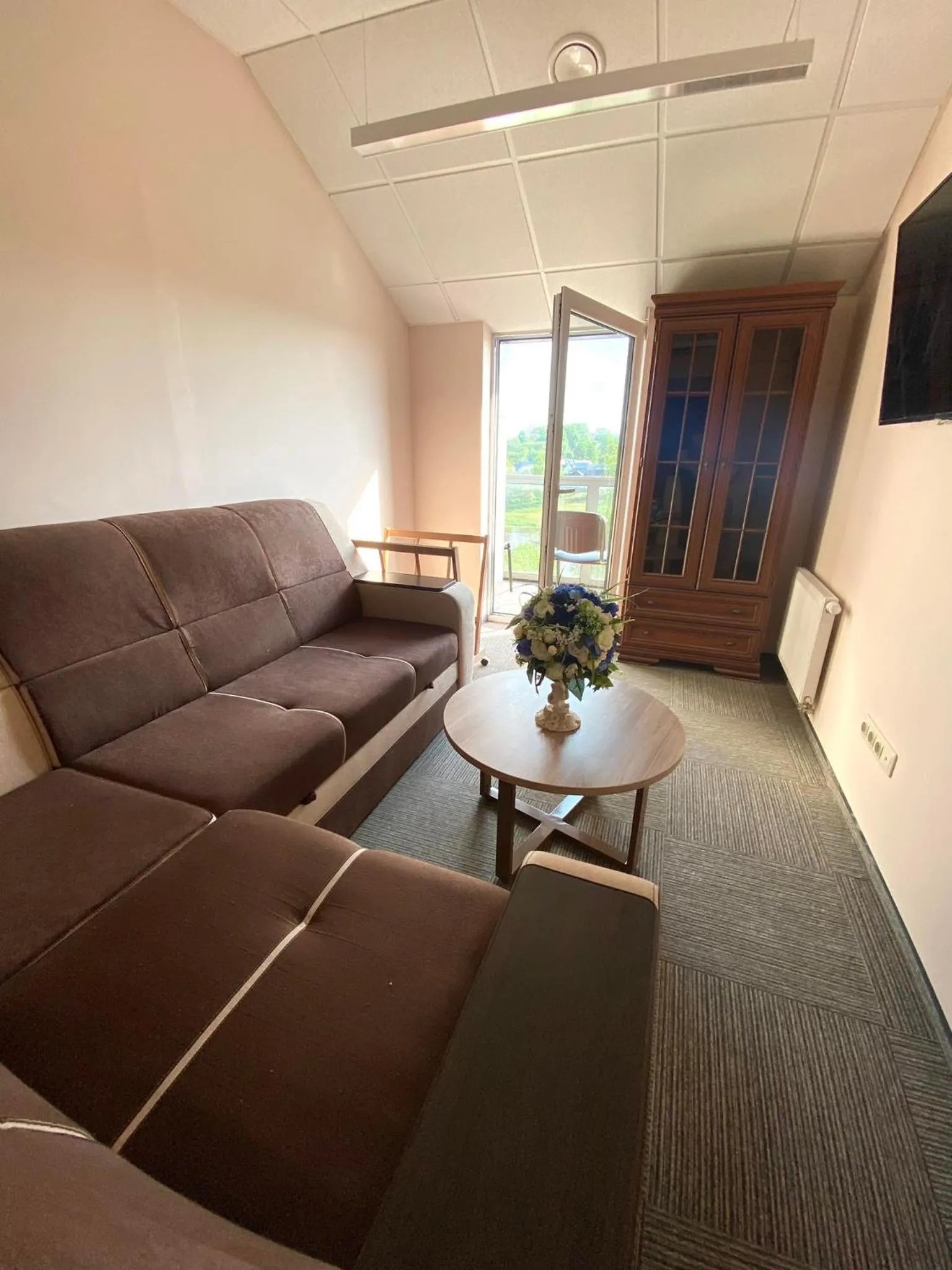 Communal lounge/ TV room in Rezidencija "Prieplauka"