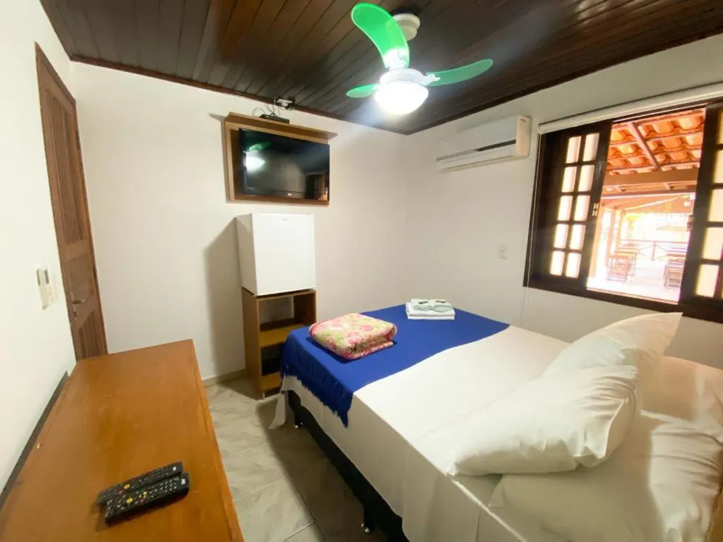 Bed in Pousada Bugio