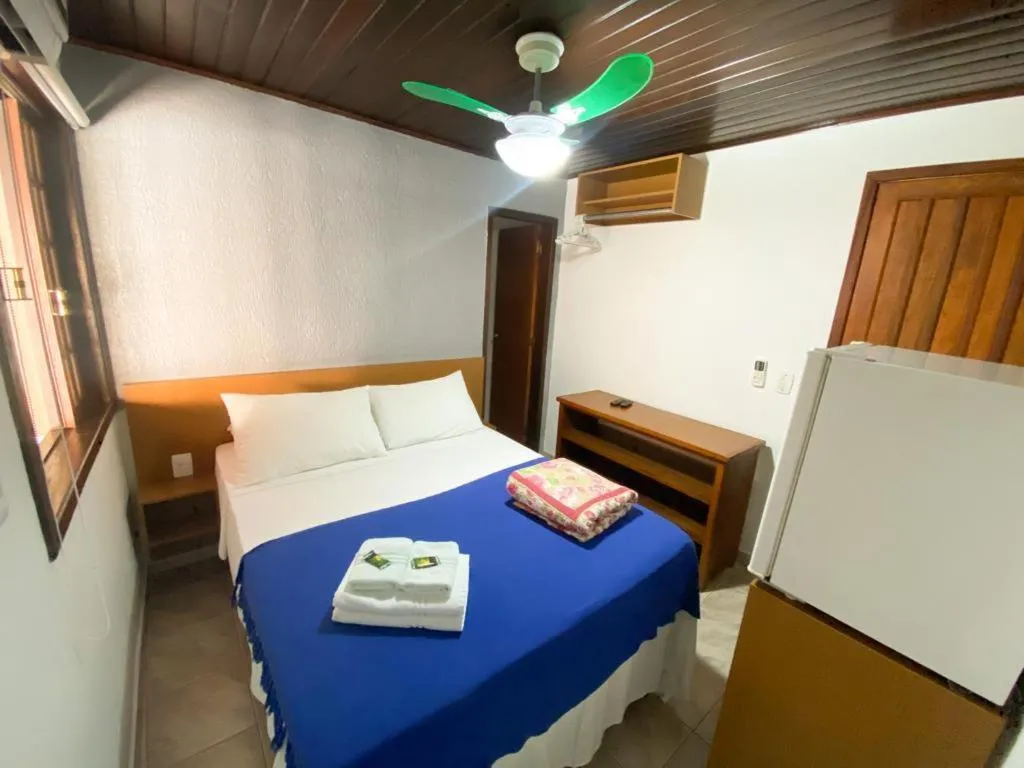 Bed in Pousada Bugio